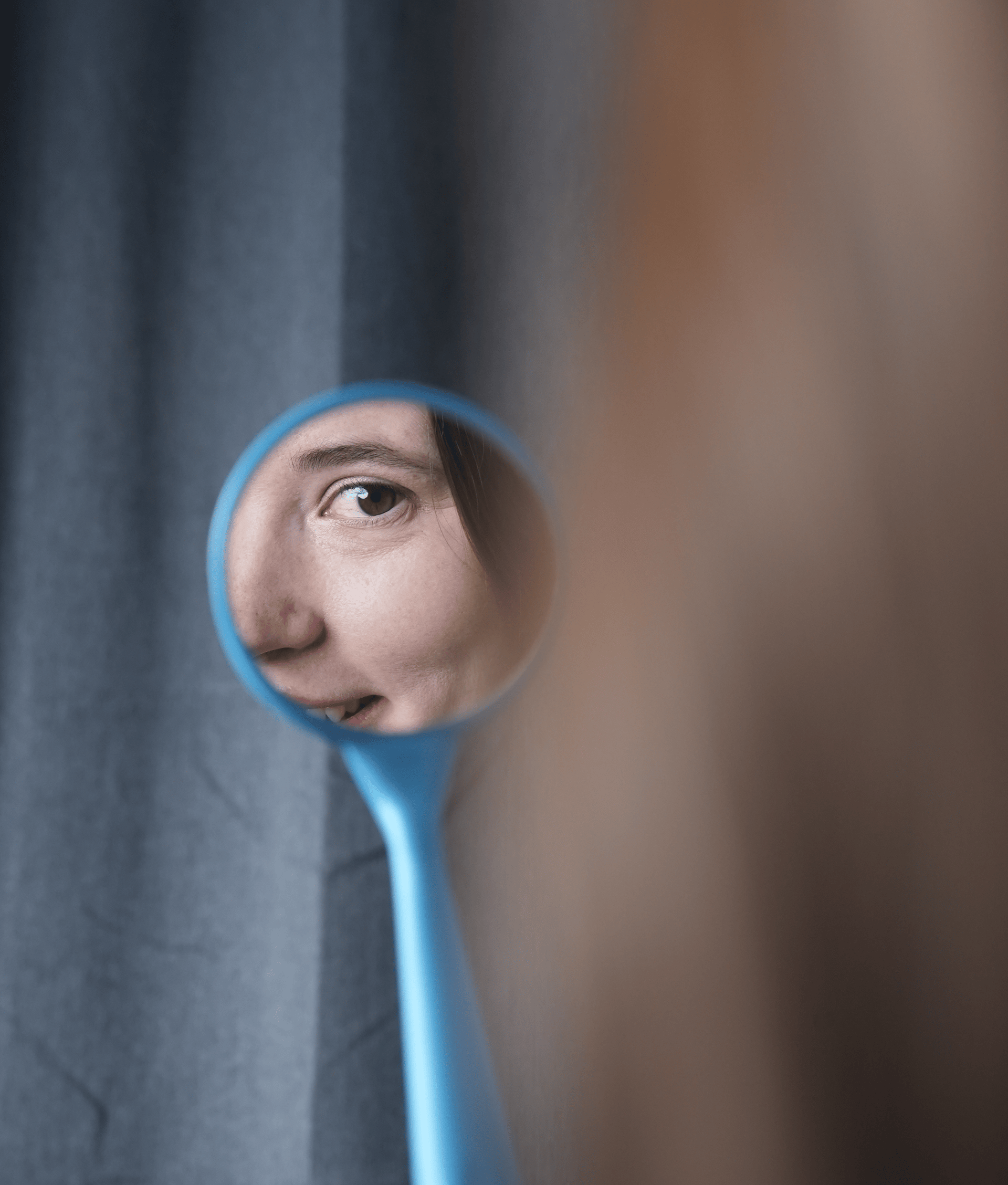 woman wearing yellow long-sleeved dress under white clouds and blue sky during daytime