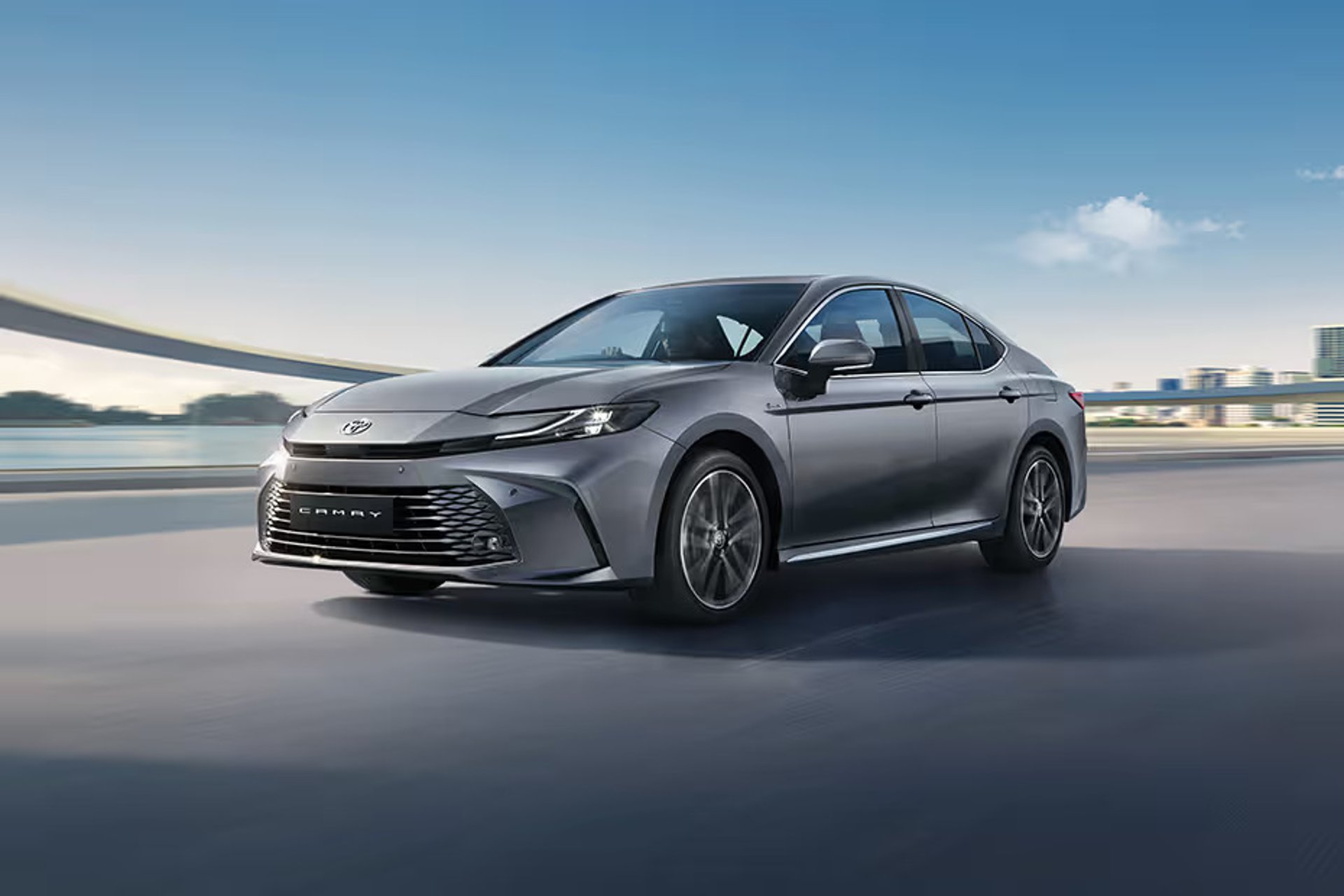 woman wearing yellow long-sleeved dress under white clouds and blue sky during daytime