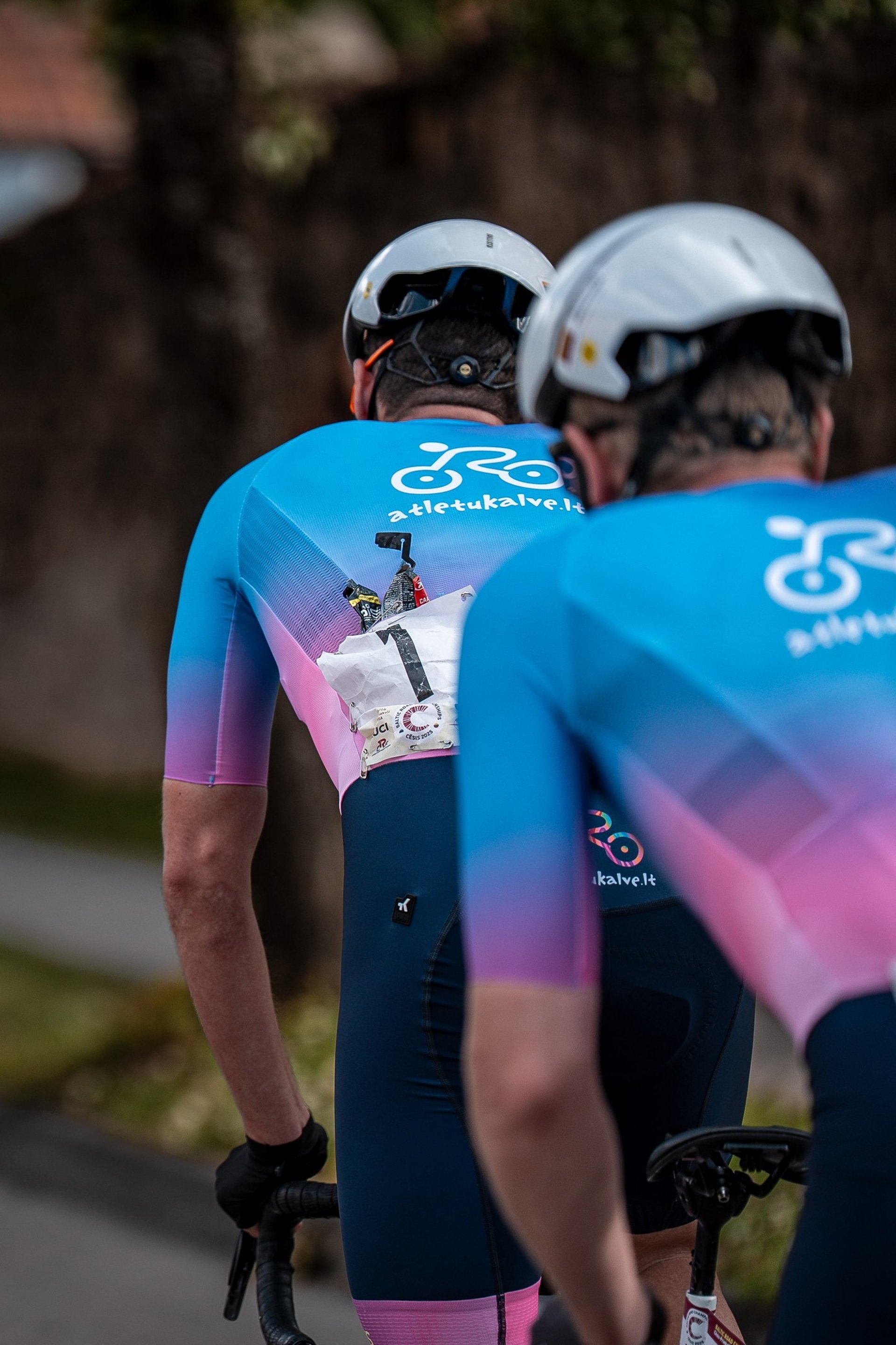an abstract photo of a curved building with a blue sky in the background