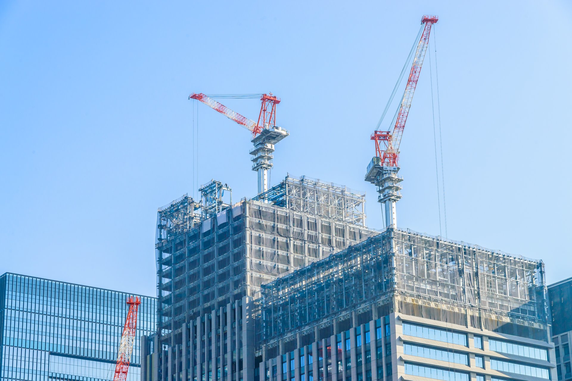 low angle photography of gray building at daytime