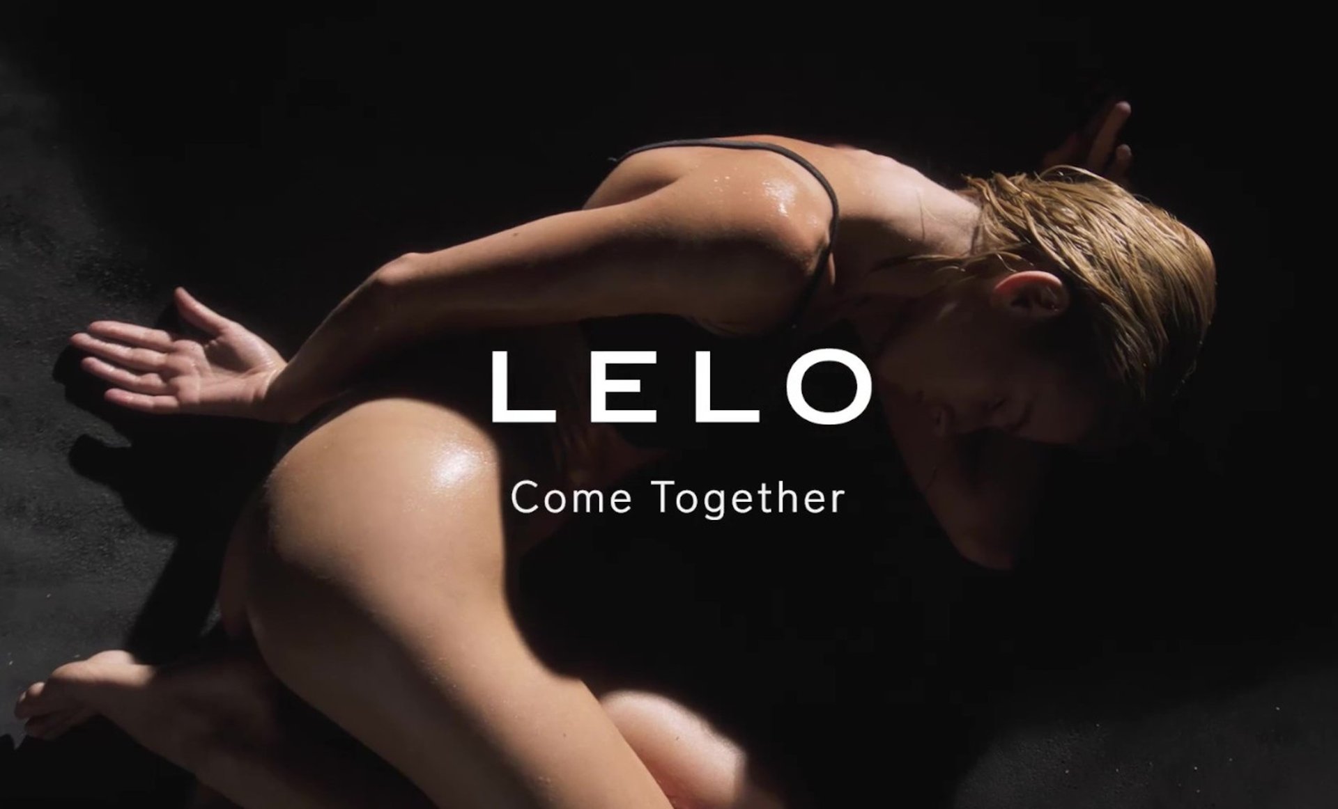 black and brown leather padded tub sofa