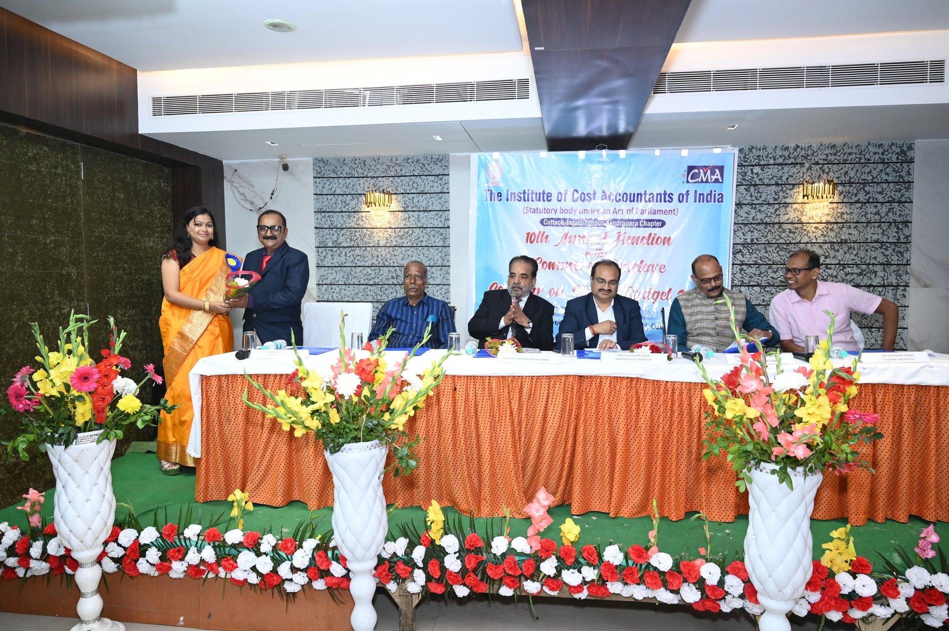 black and brown leather padded tub sofa
