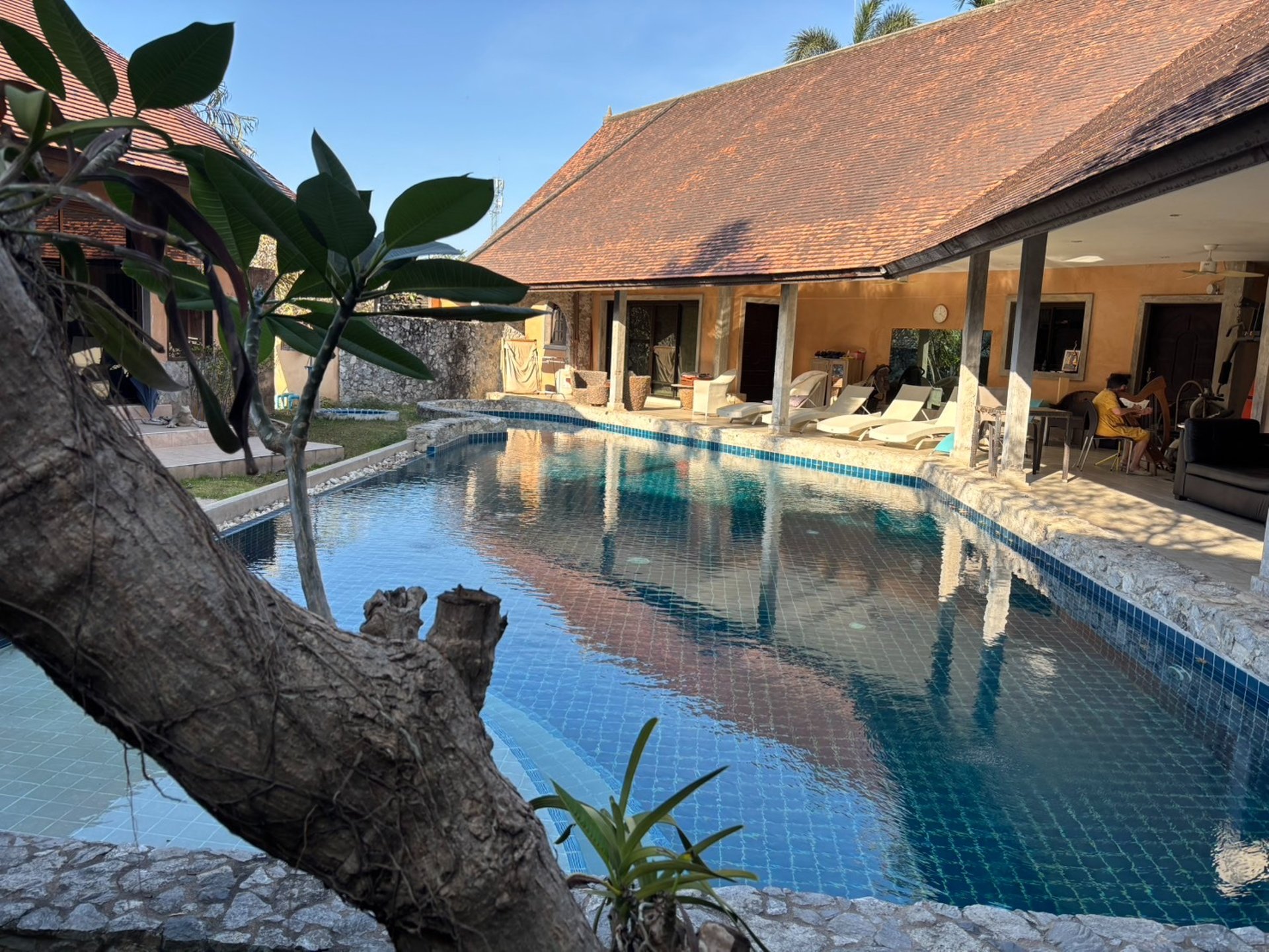 black and brown leather padded tub sofa