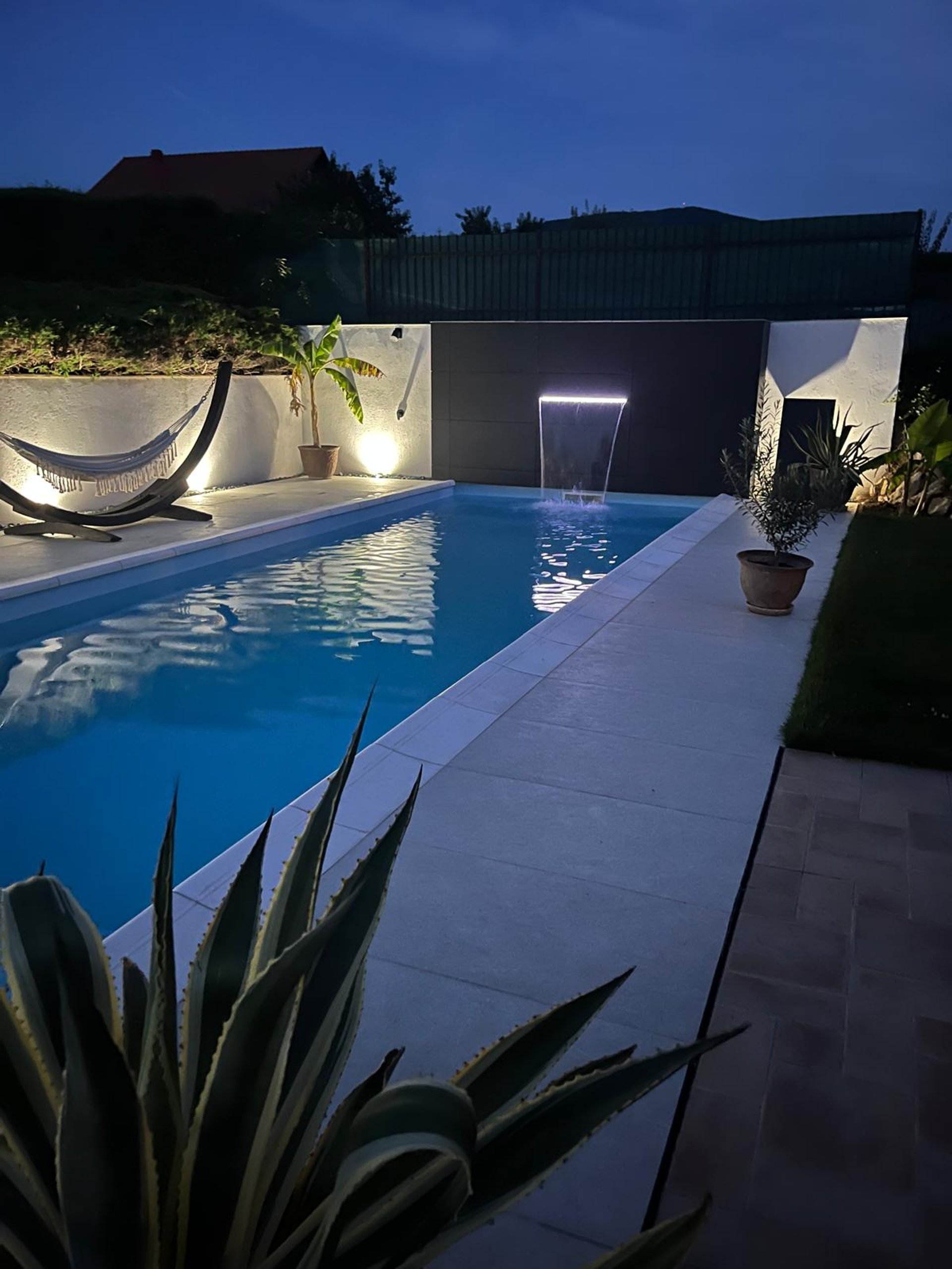 woman wearing yellow long-sleeved dress under white clouds and blue sky during daytime