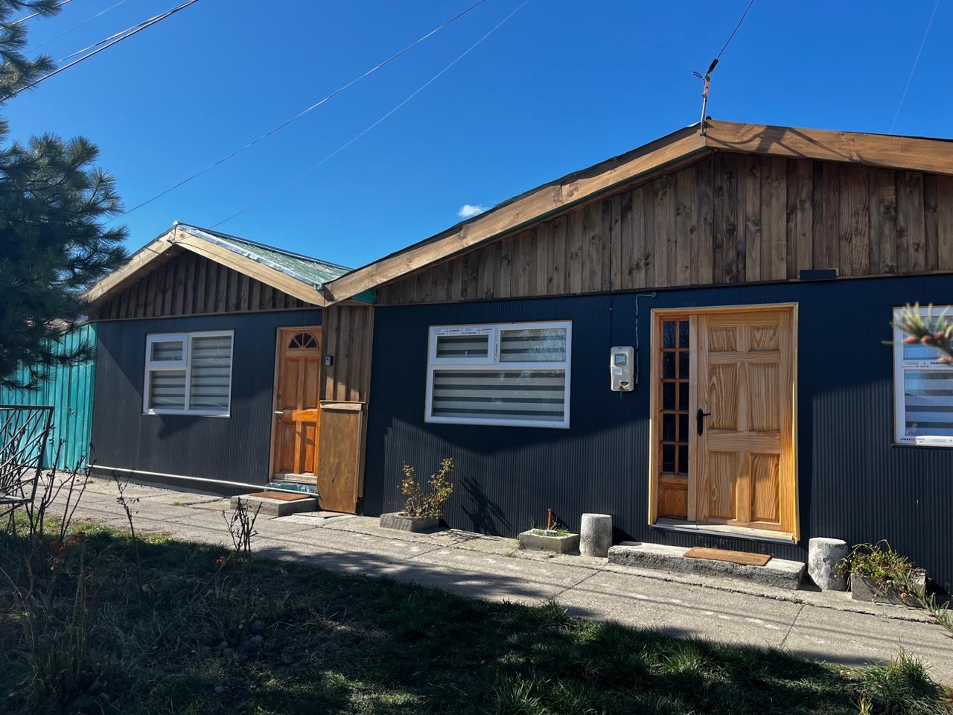 black and brown leather padded tub sofa