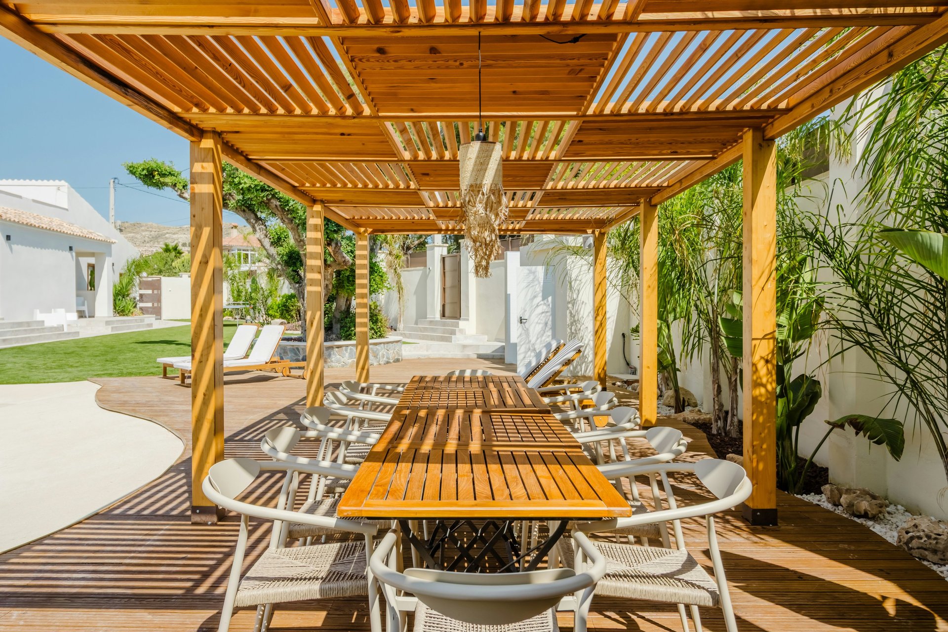 woman wearing yellow long-sleeved dress under white clouds and blue sky during daytime