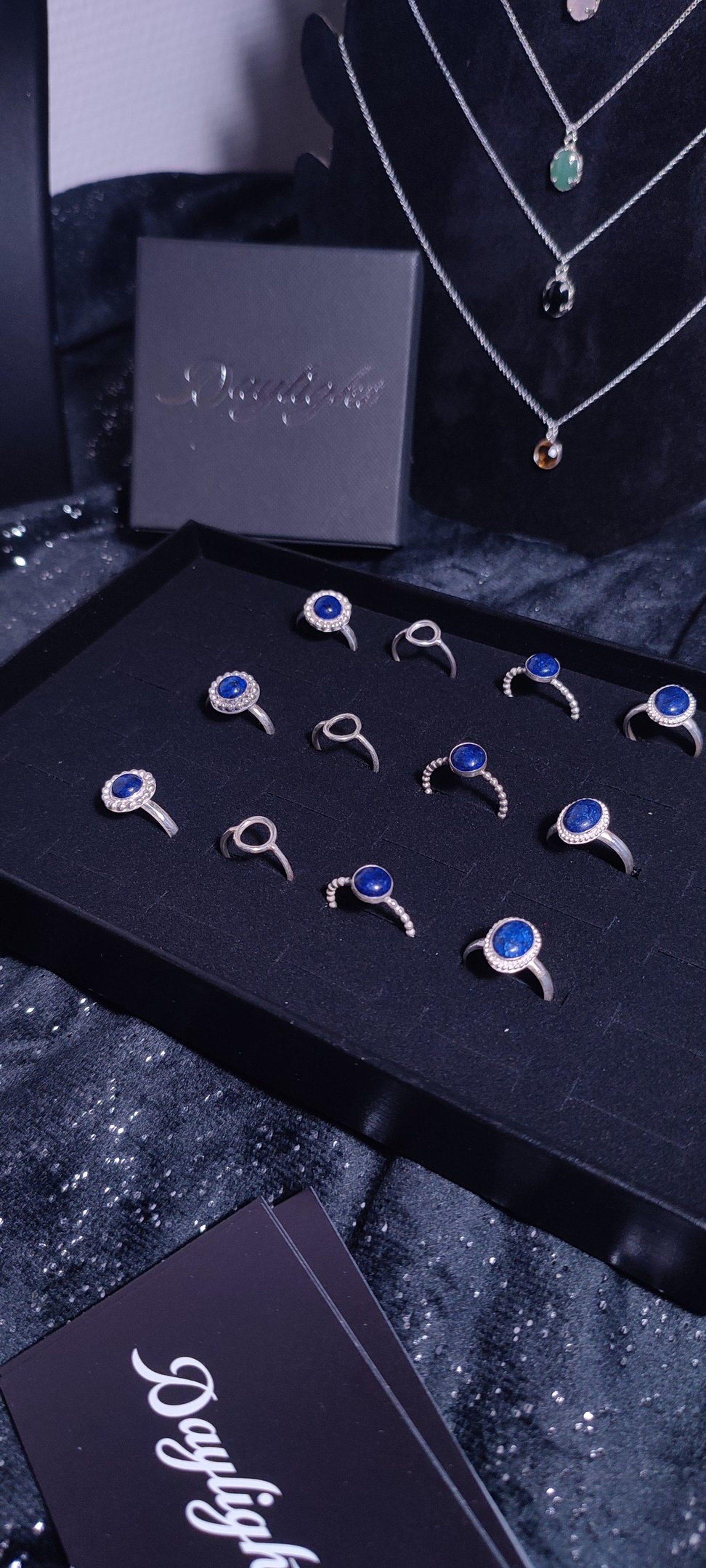 deer near tall trees covered with fogs