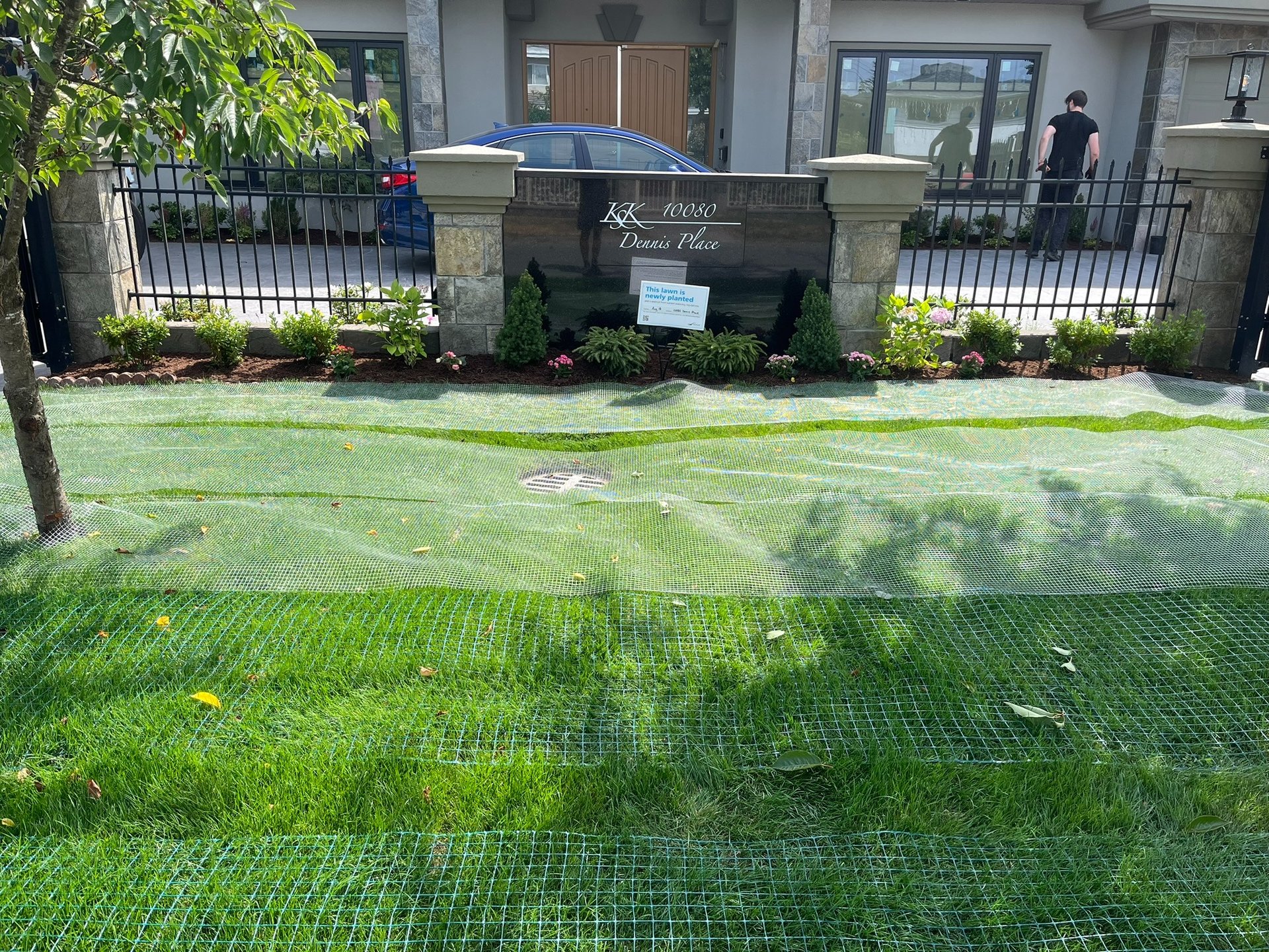 an abstract photo of a curved building with a blue sky in the background