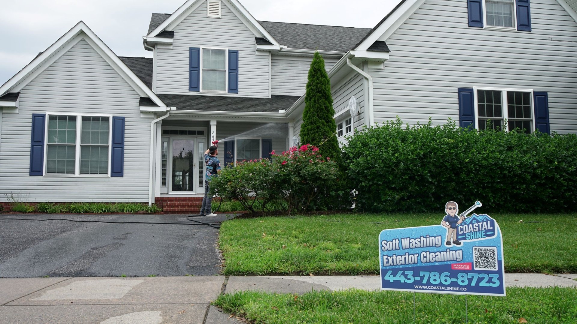 white and brown wooden house near green trees under blue sky during daytime
