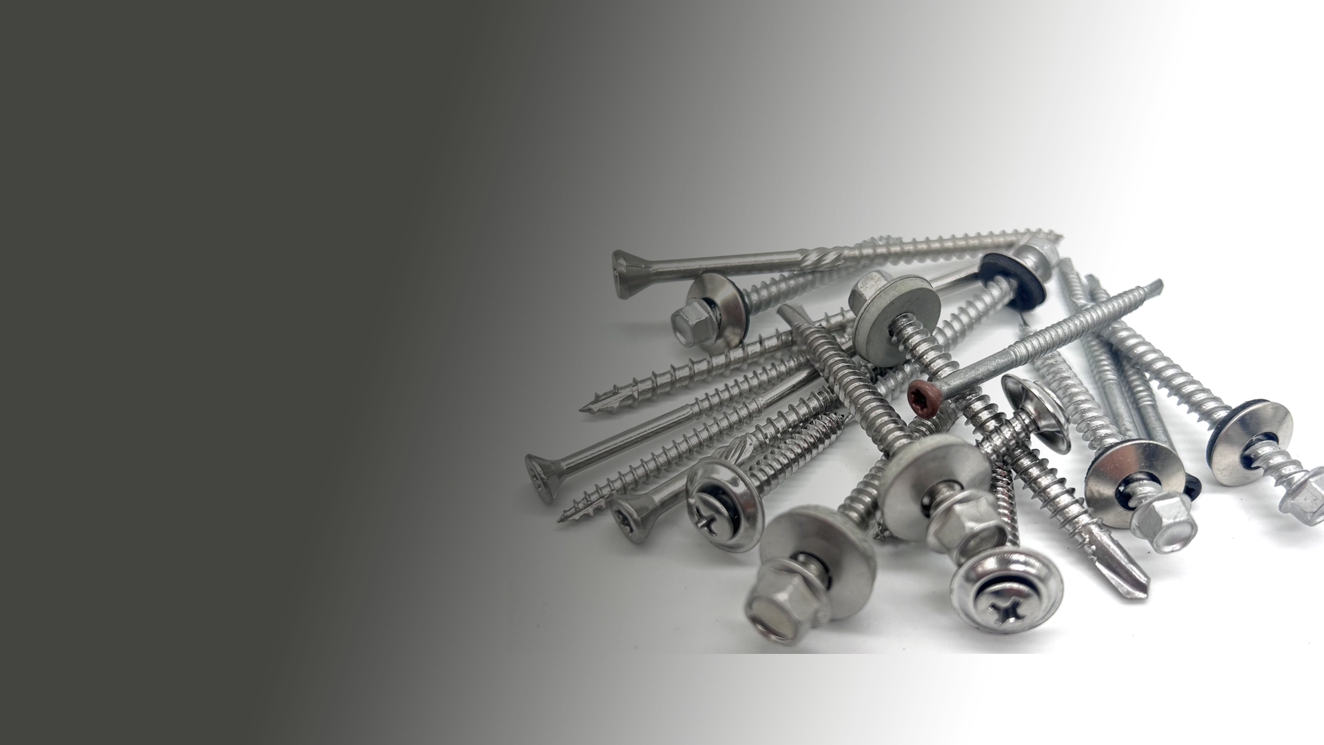 gray metal tools on white surface