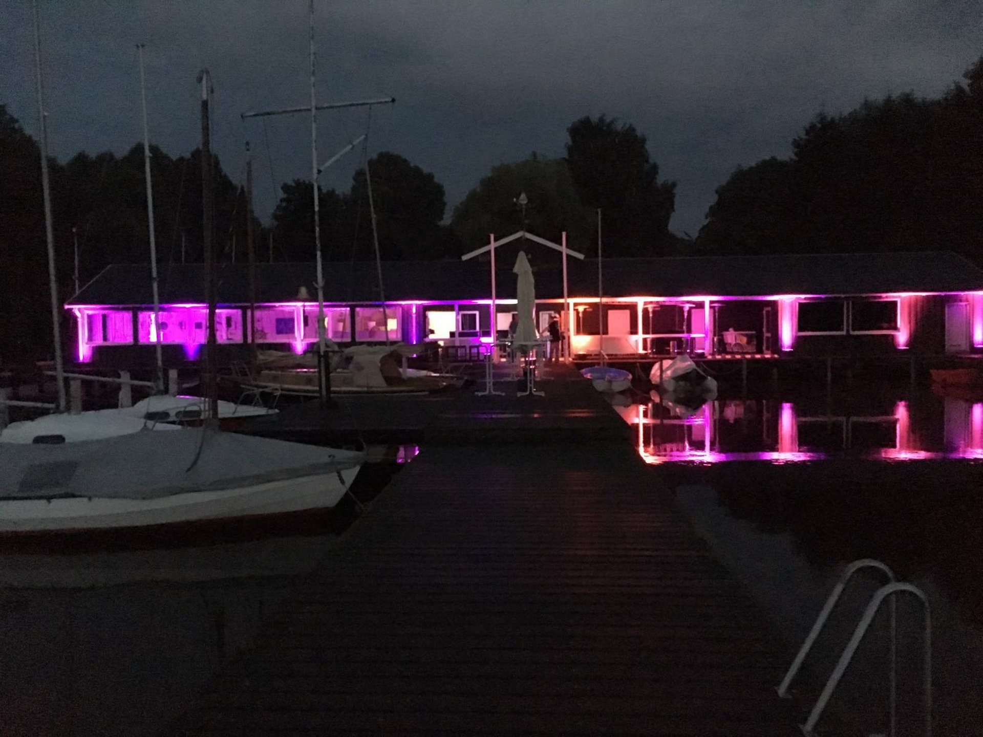 woman wearing yellow long-sleeved dress under white clouds and blue sky during daytime