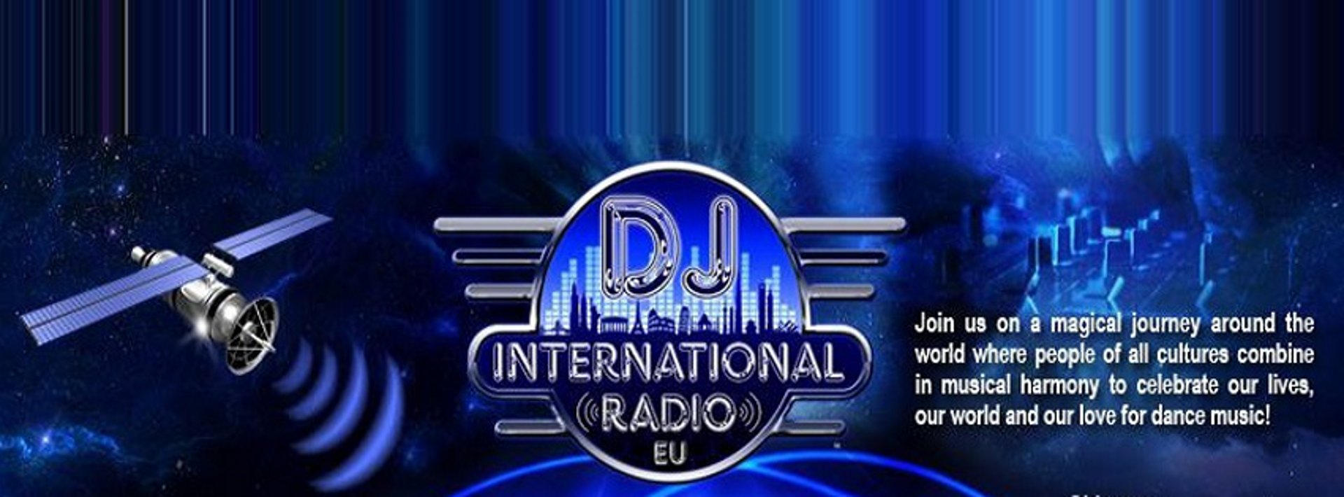 a stage with a laptop and microphone in front of a crowd