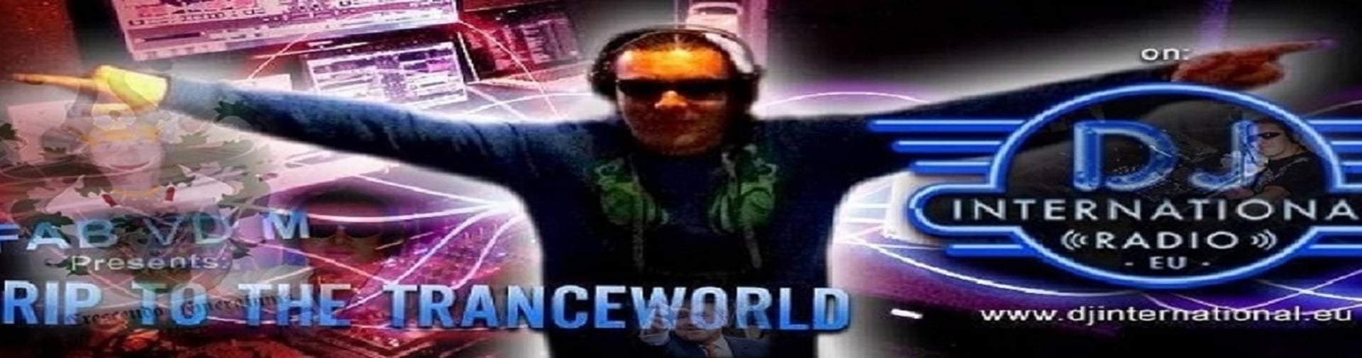 a stage with a laptop and microphone in front of a crowd