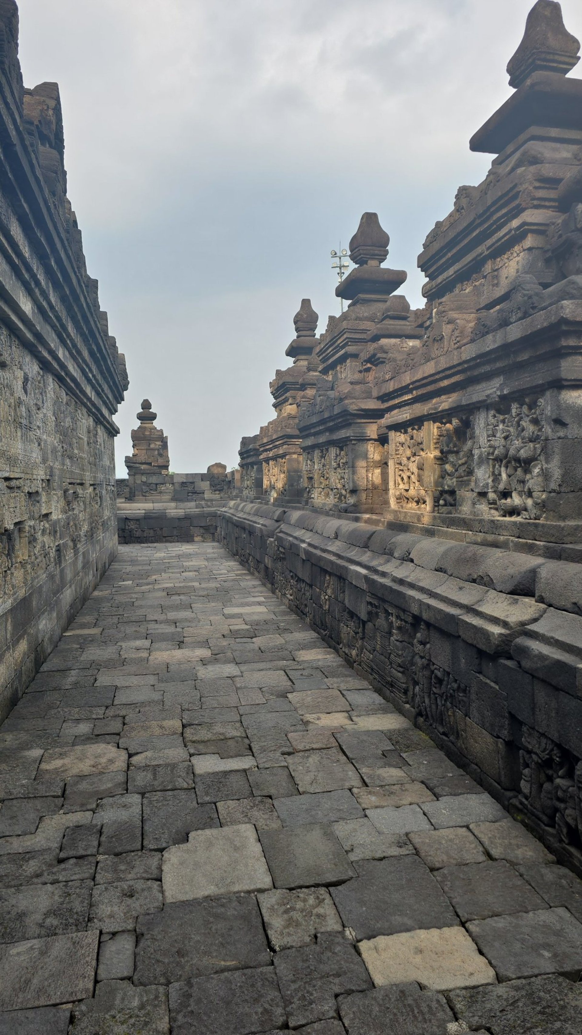 man standing near building
