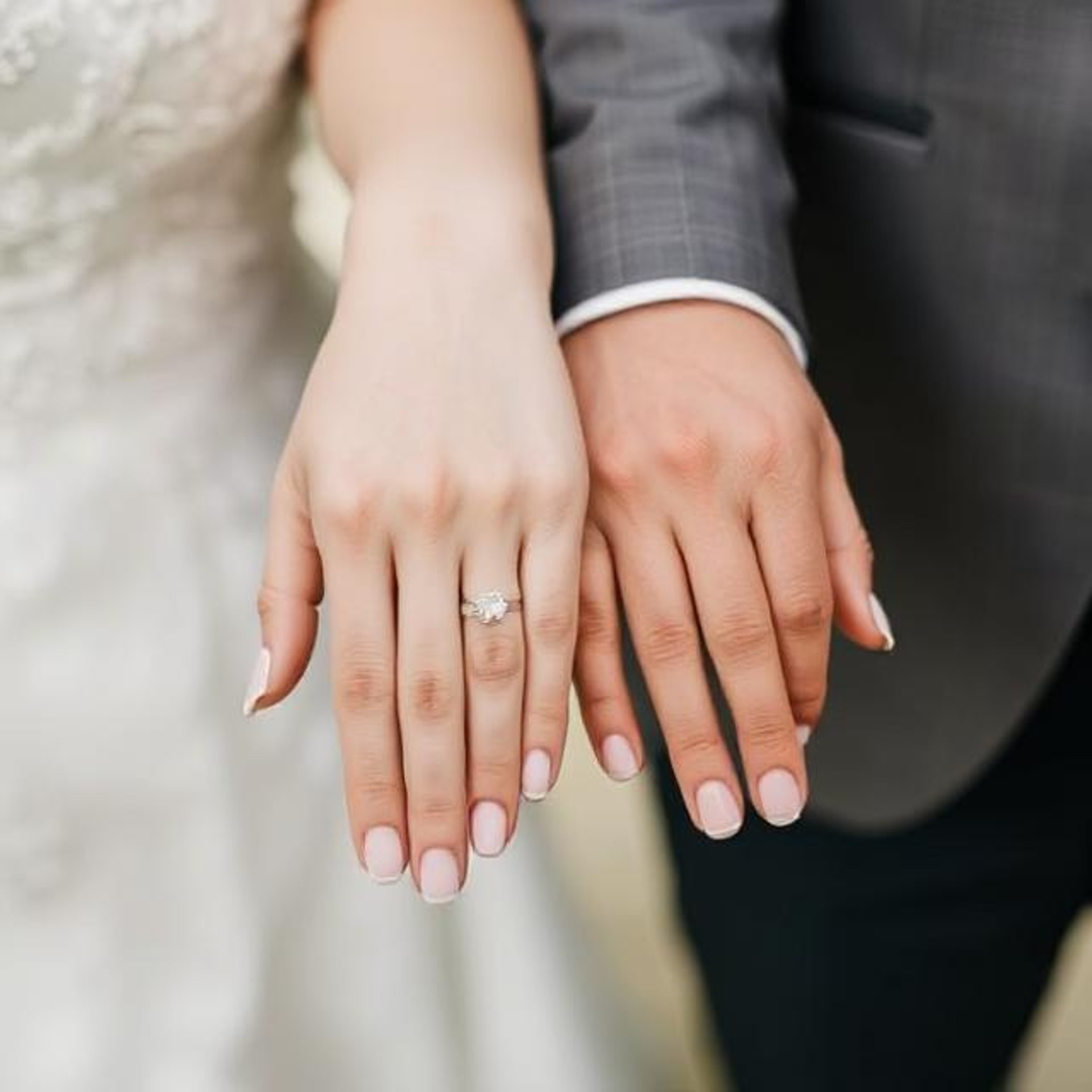 an abstract photo of a curved building with a blue sky in the background