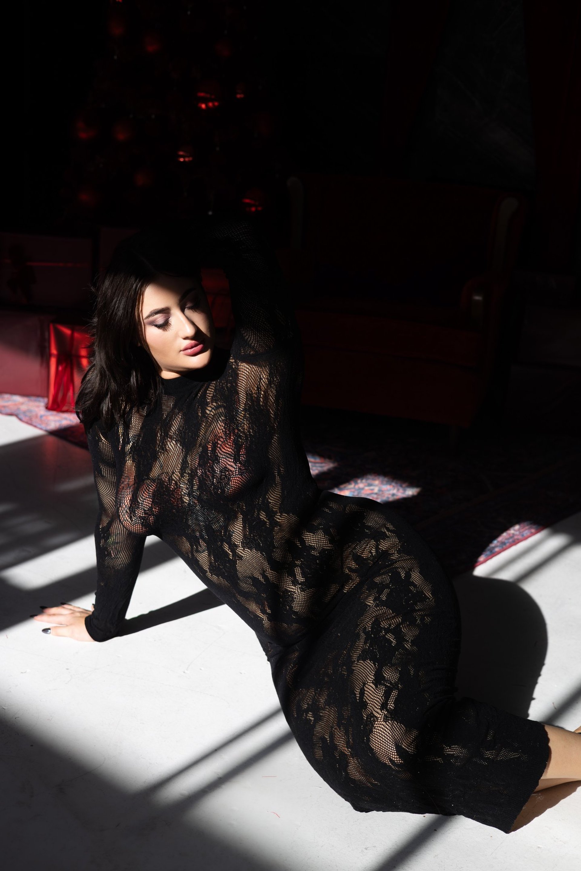 an abstract photo of a curved building with a blue sky in the background