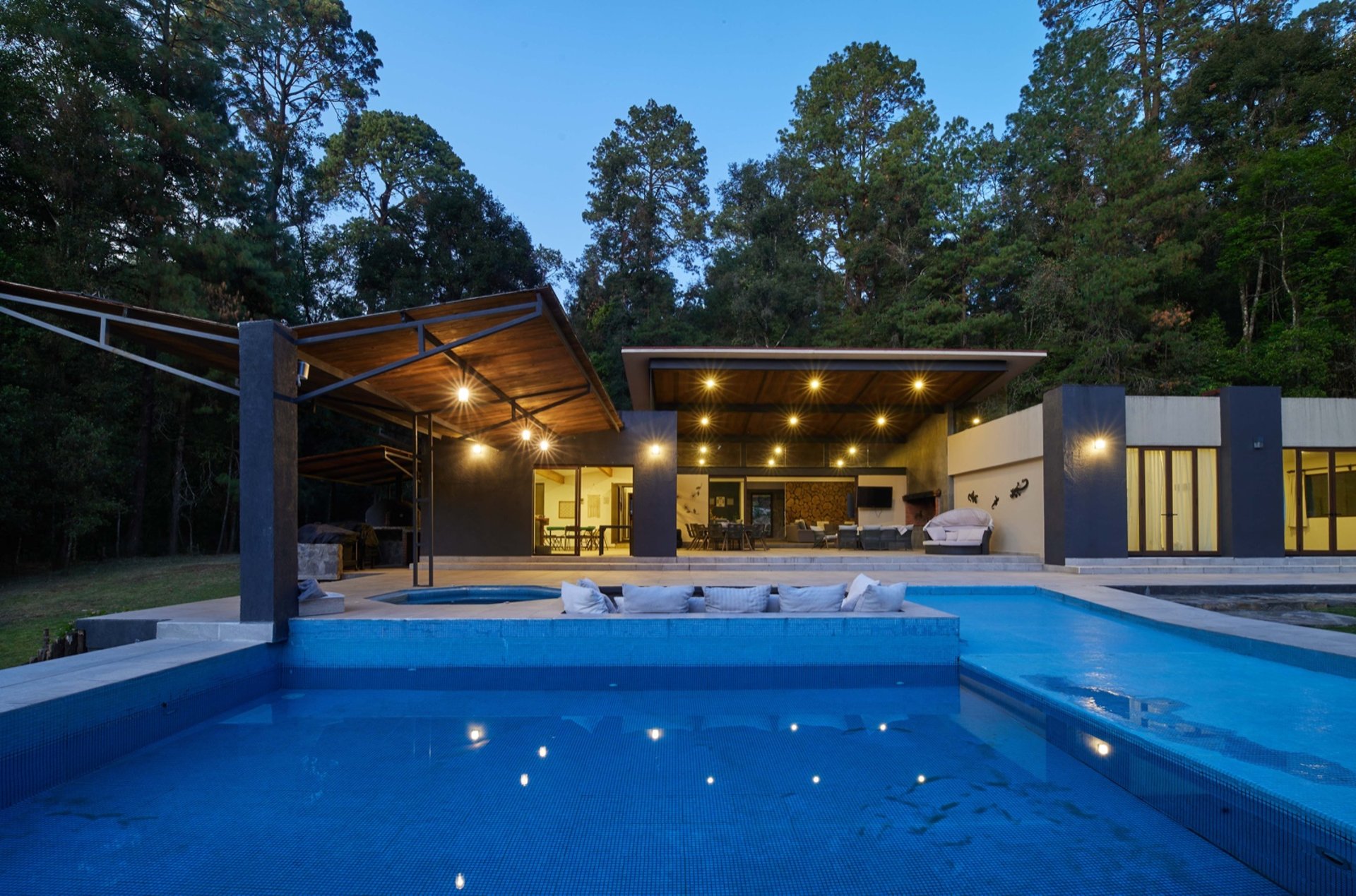 black and brown leather padded tub sofa