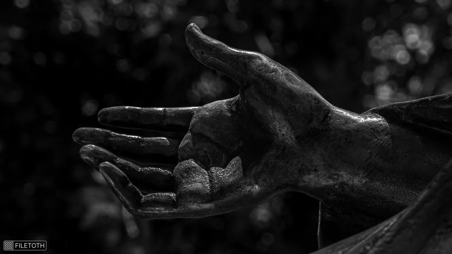 Saint Barbara’s protective hand expressing a guarding gesture.