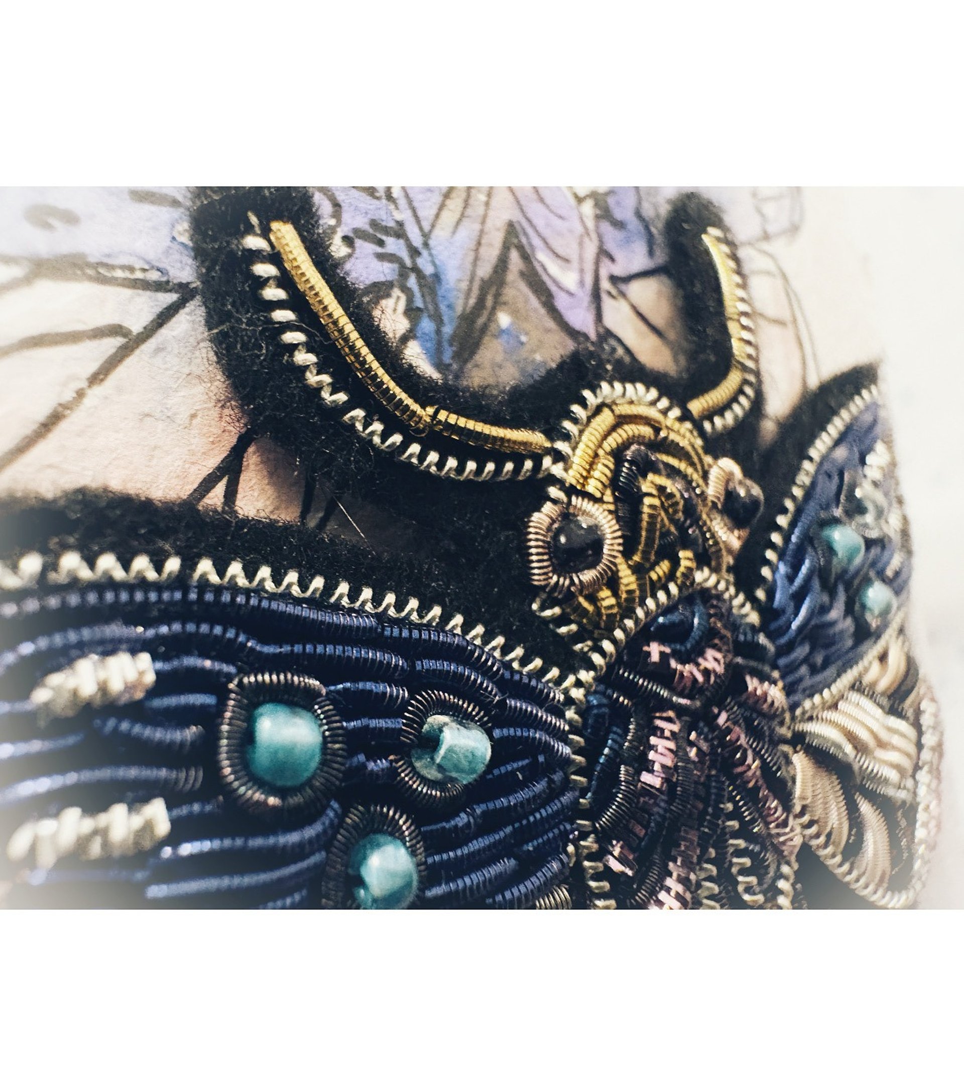 person wearing grey knit sweater