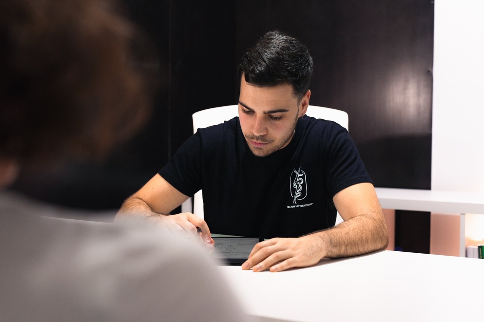 black and brown leather padded tub sofa