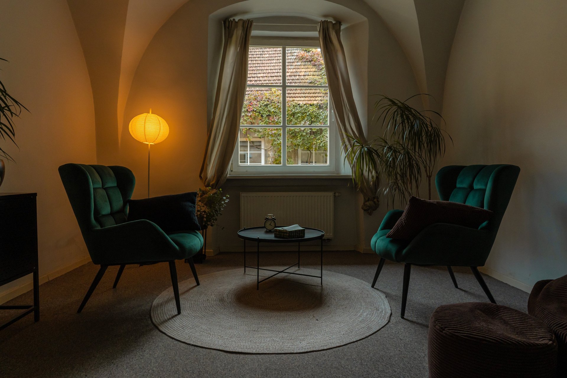 black and brown leather padded tub sofa