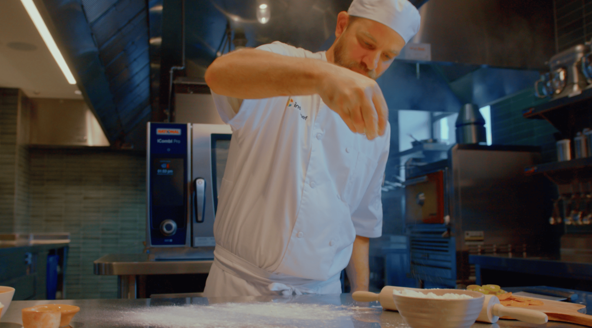 an abstract photo of a curved building with a blue sky in the background