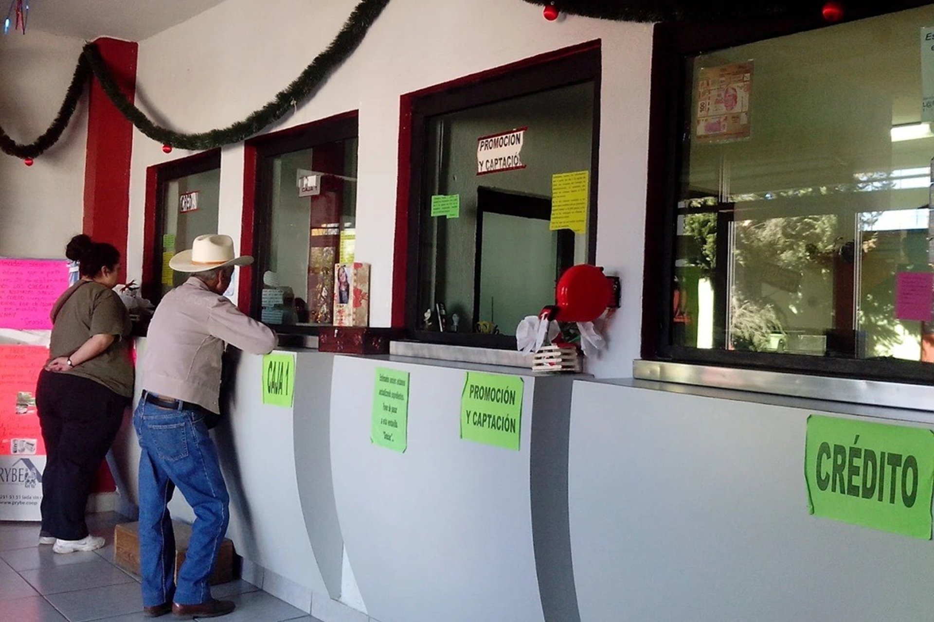 black and brown leather padded tub sofa