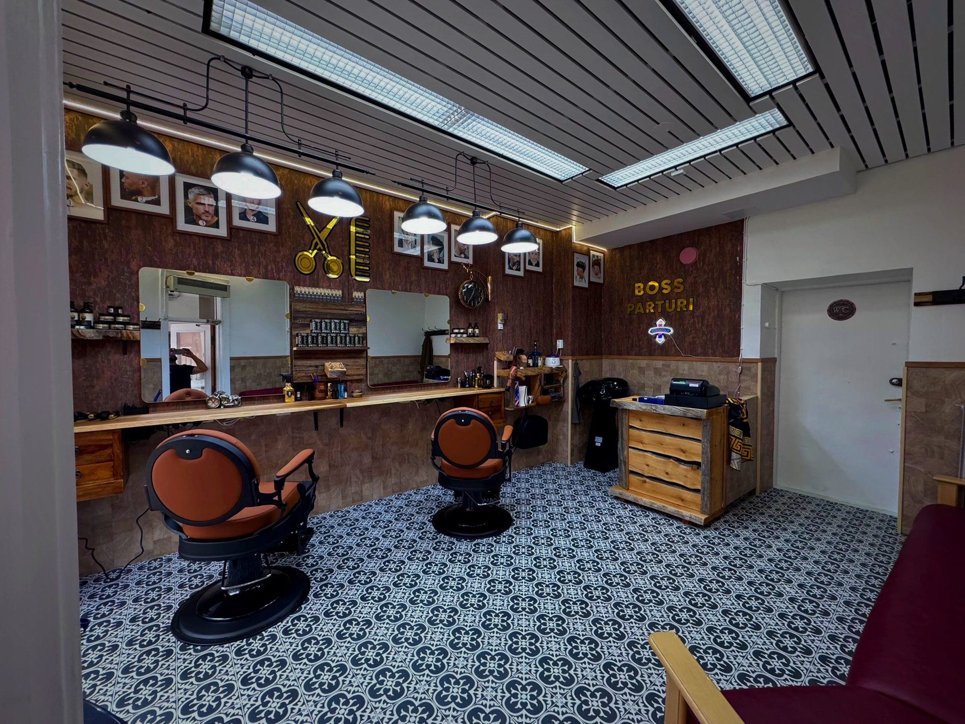 black and brown leather padded tub sofa