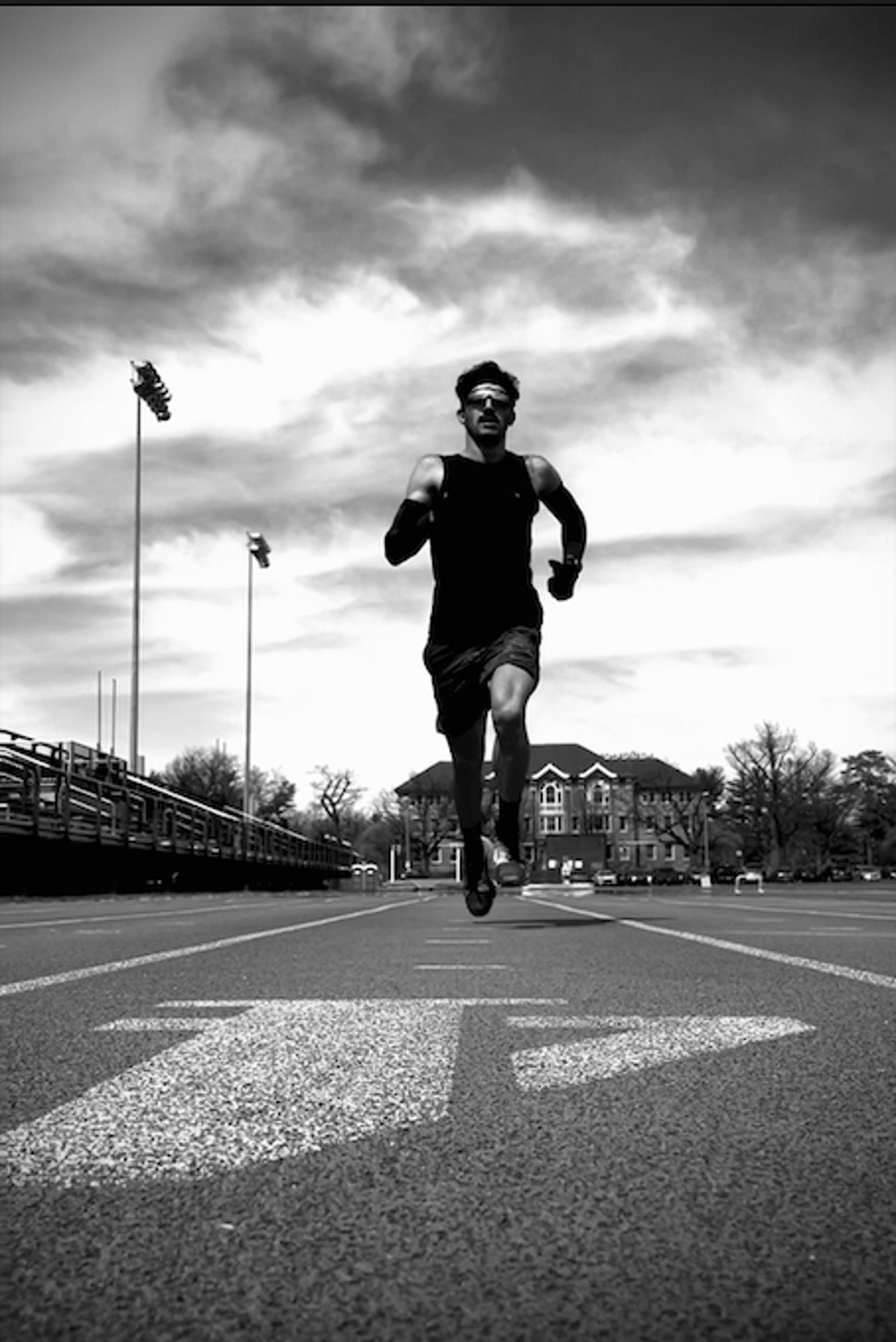 black and brown leather padded tub sofa