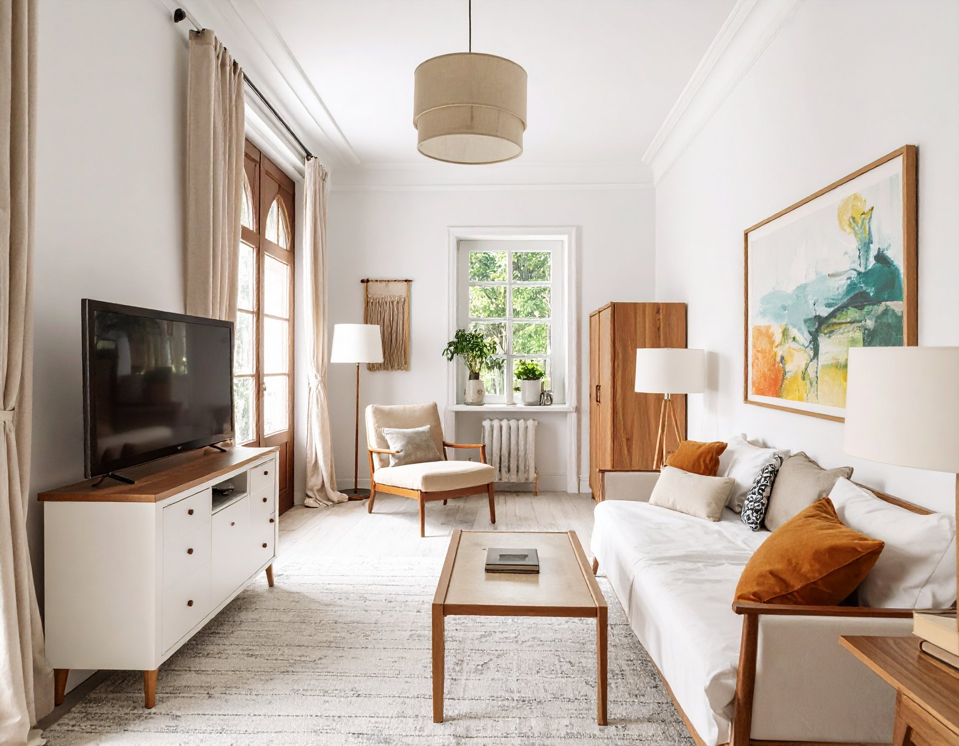 a room with a table, chairs and a painting on the wall