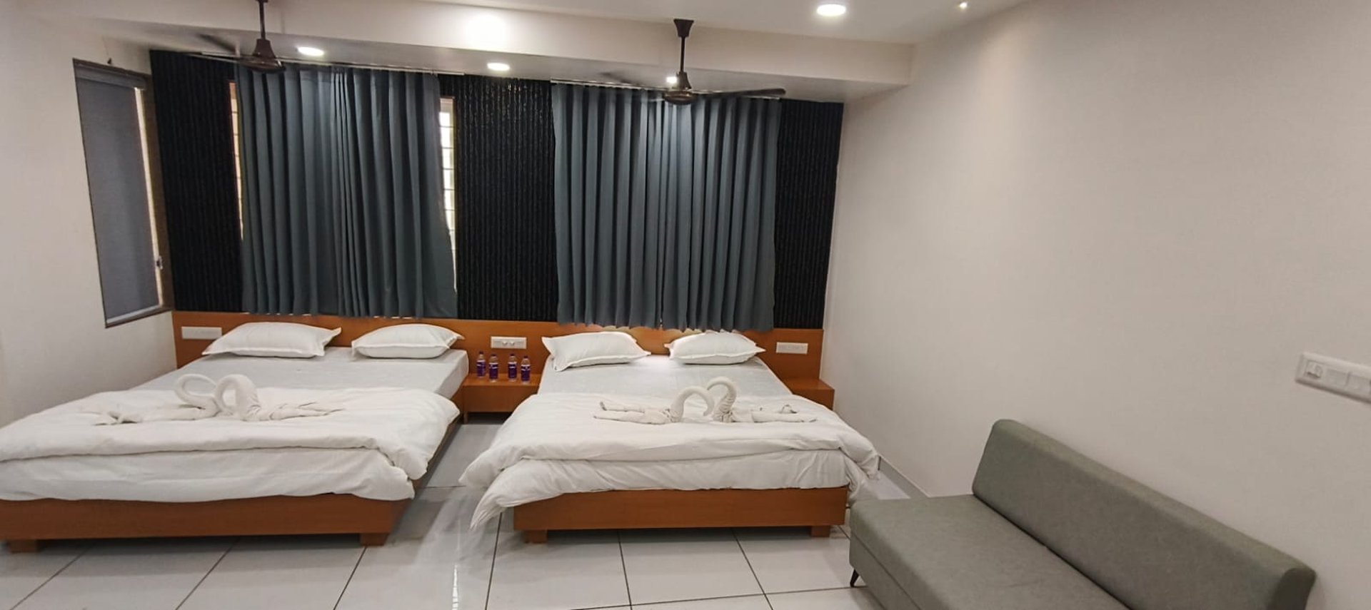 black and brown leather padded tub sofa