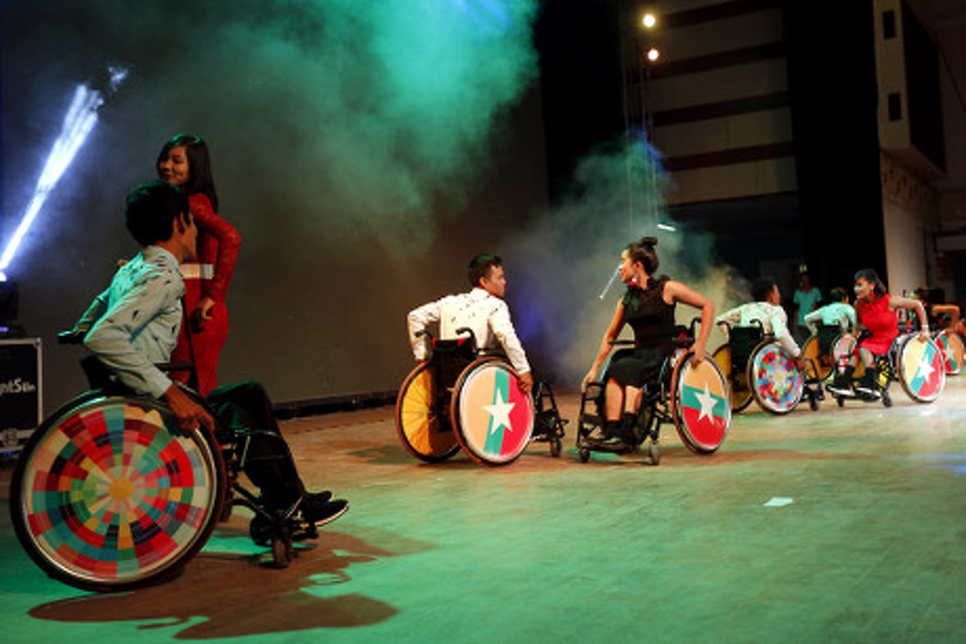 an abstract photo of a curved building with a blue sky in the background
