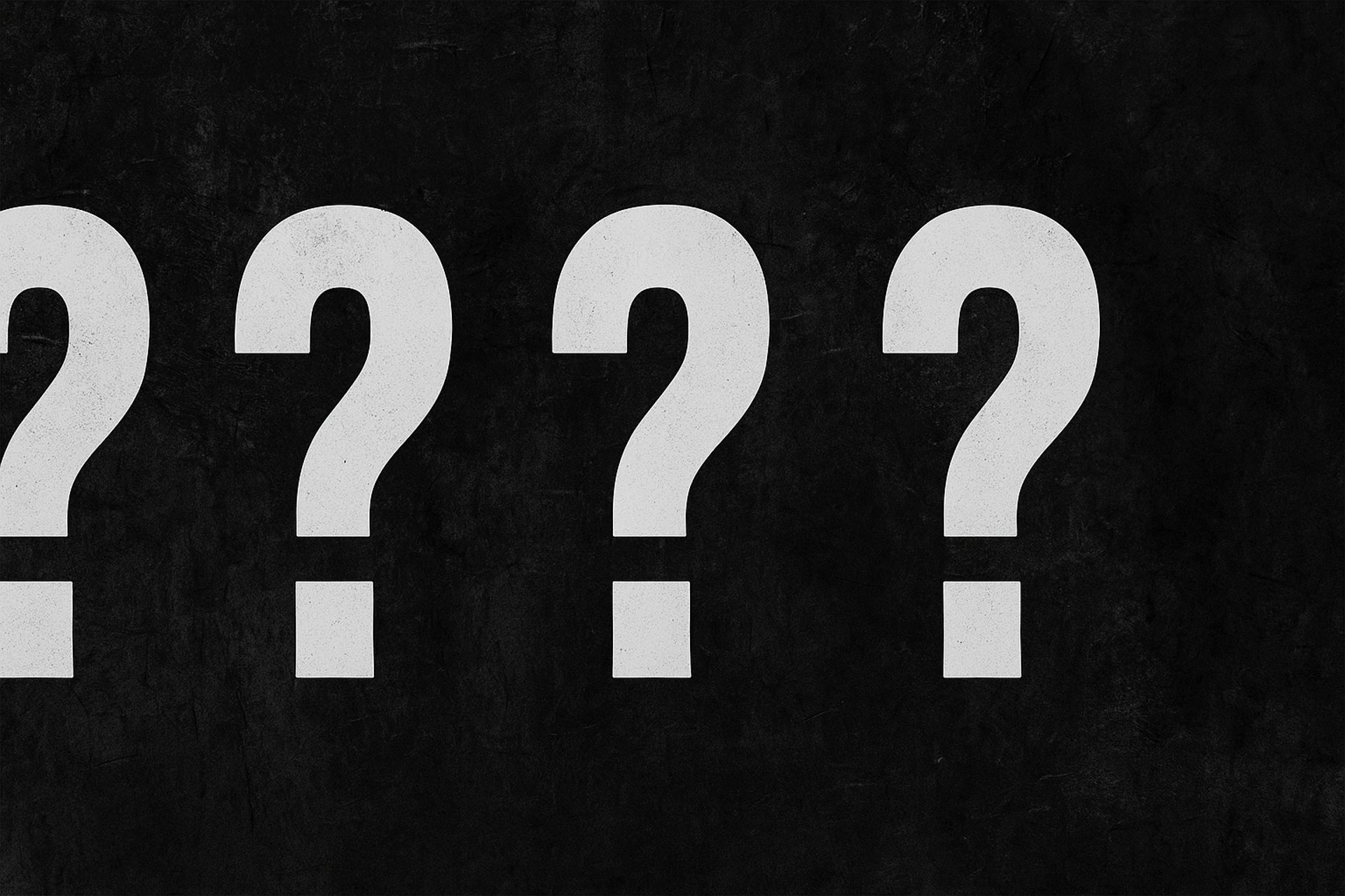 A group of question marks sitting next to each other