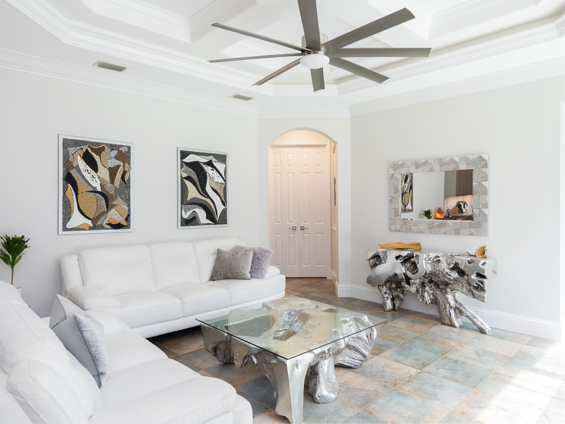 an abstract photo of a curved building with a blue sky in the background