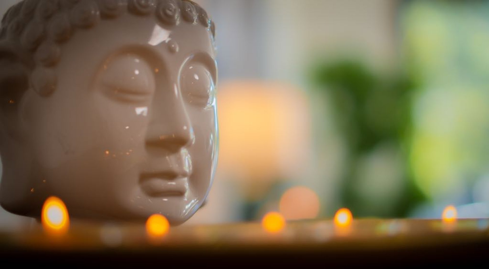 an abstract photo of a curved building with a blue sky in the background