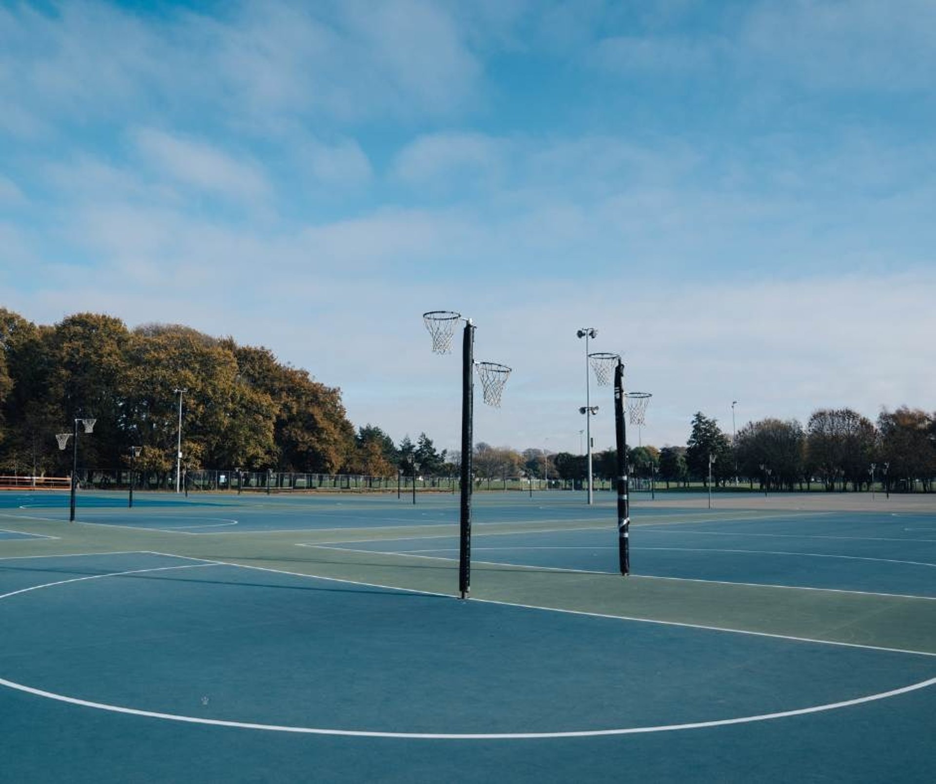 a black and white photo of a basketball court