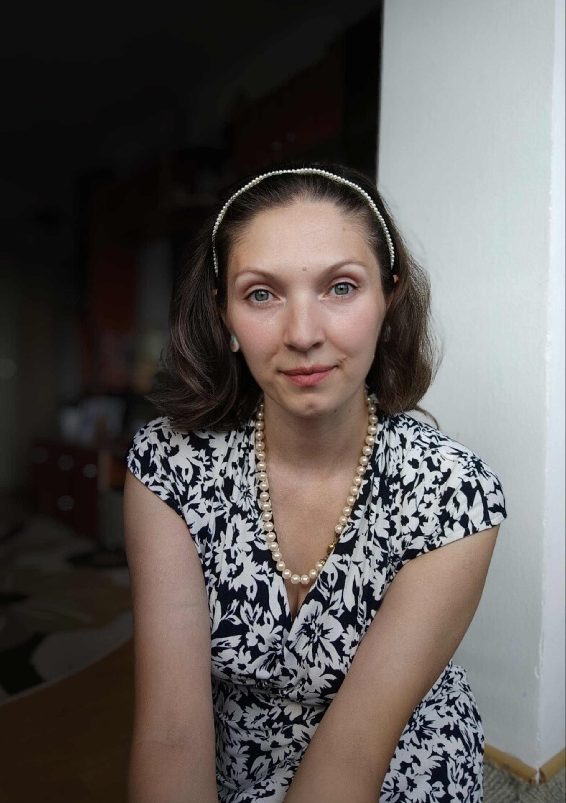 an abstract photo of a curved building with a blue sky in the background