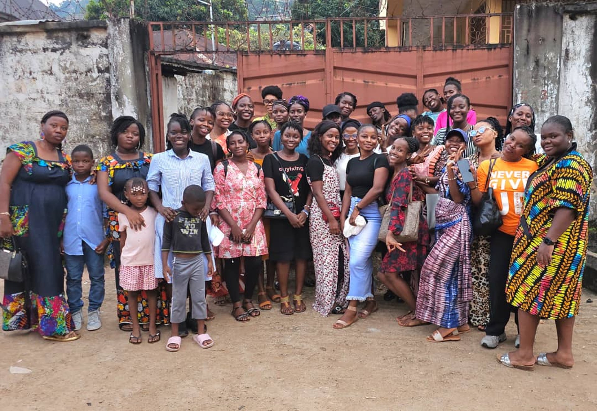 woman wearing yellow long-sleeved dress under white clouds and blue sky during daytime