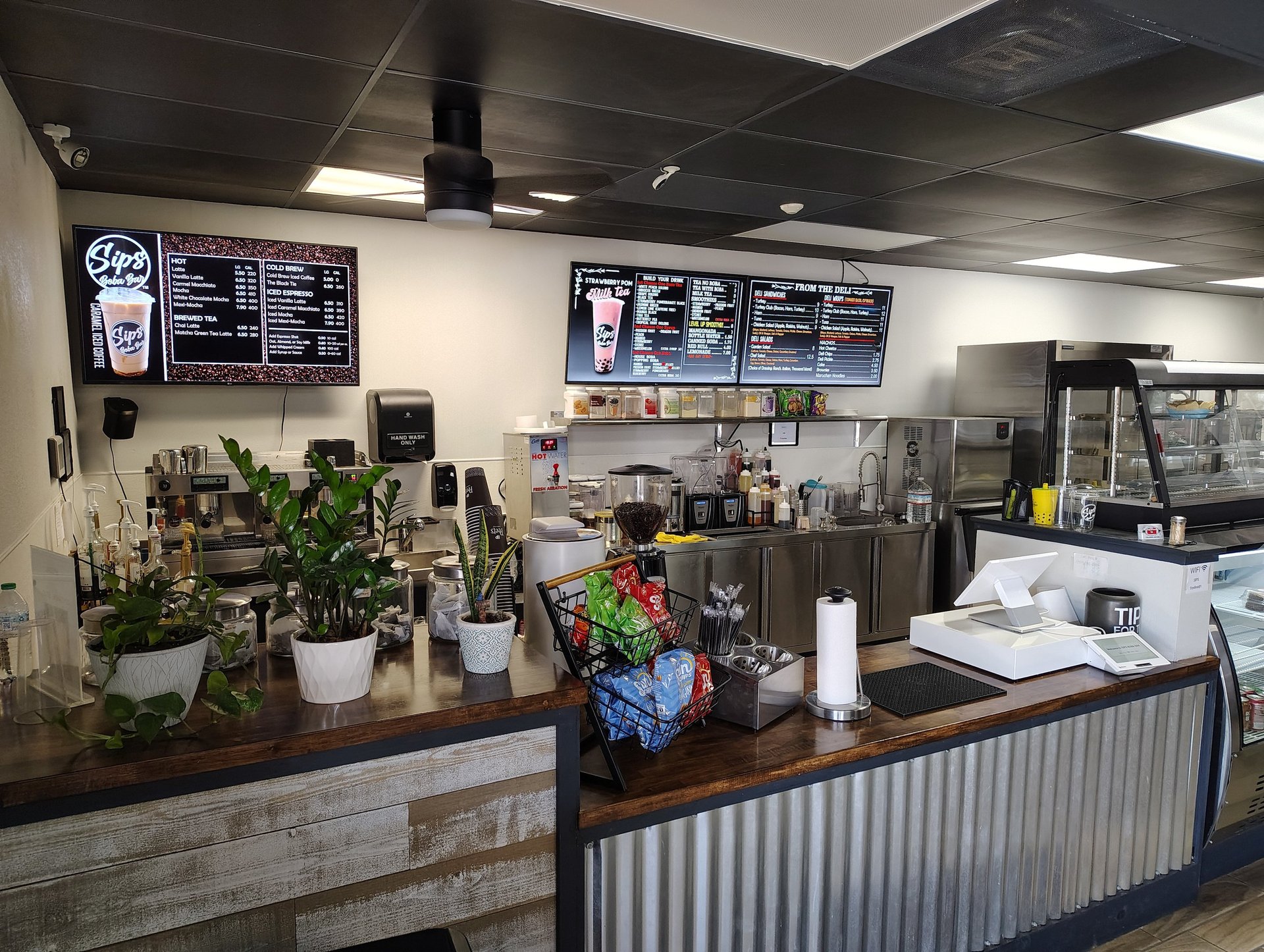 black and brown leather padded tub sofa