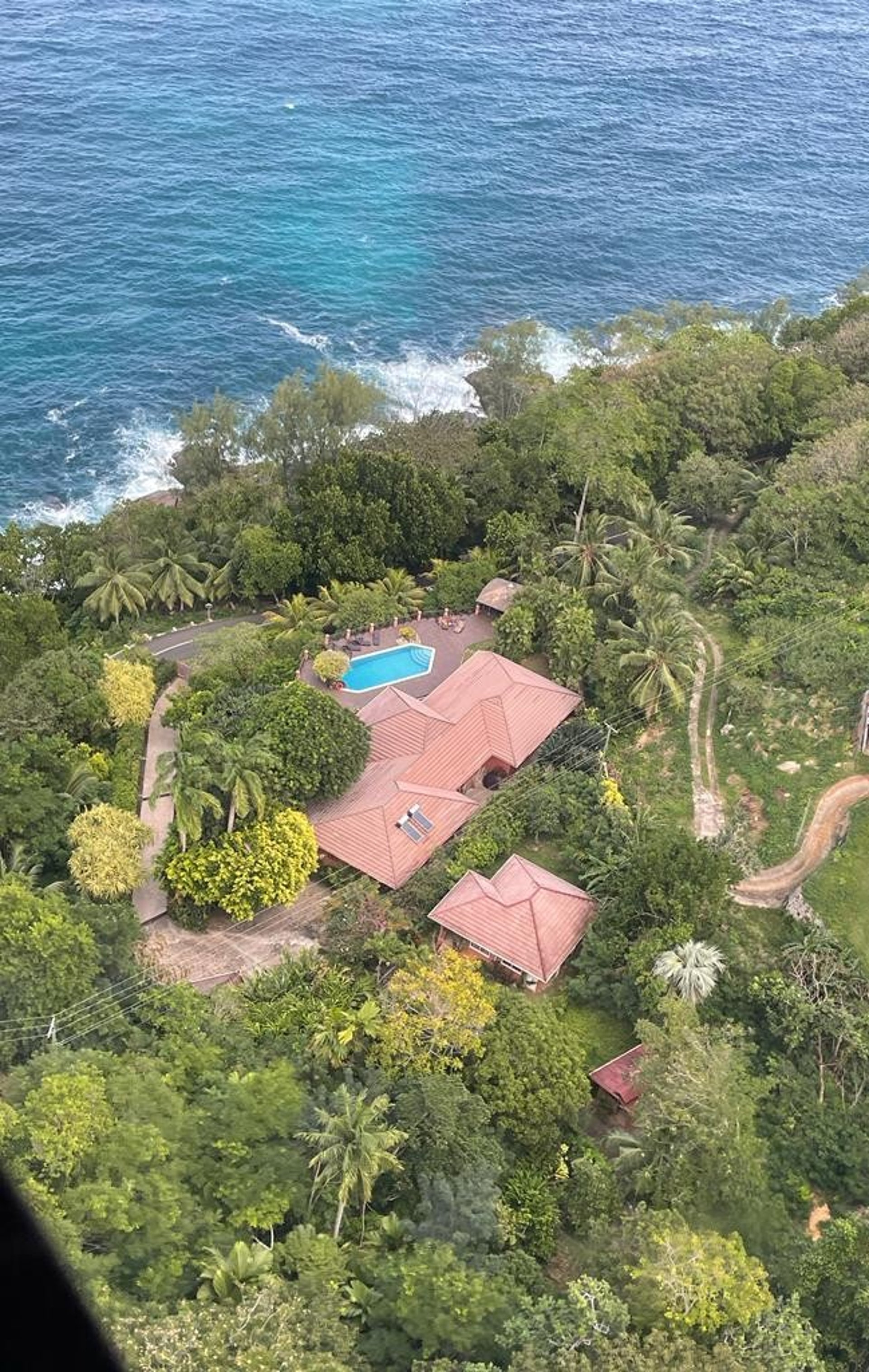 woman wearing yellow long-sleeved dress under white clouds and blue sky during daytime