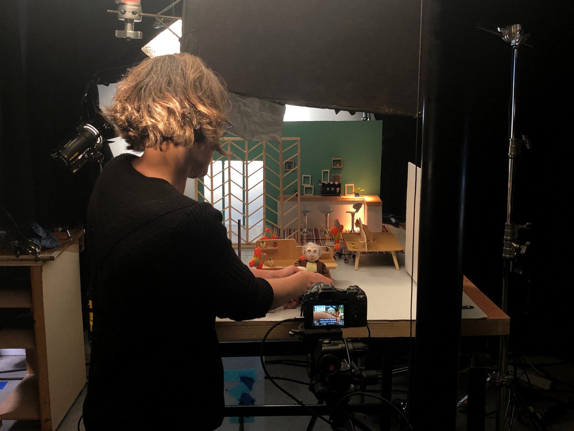 an abstract photo of a curved building with a blue sky in the background