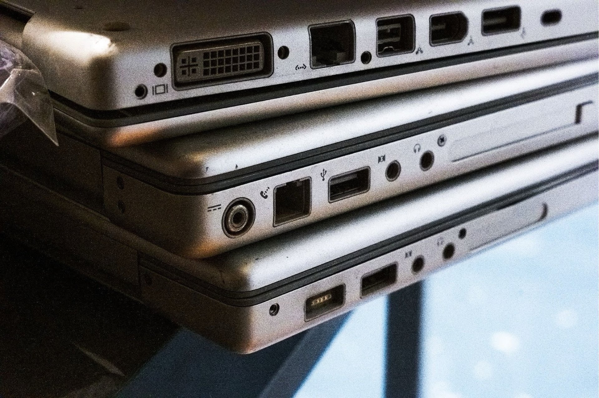 an abstract photo of a curved building with a blue sky in the background