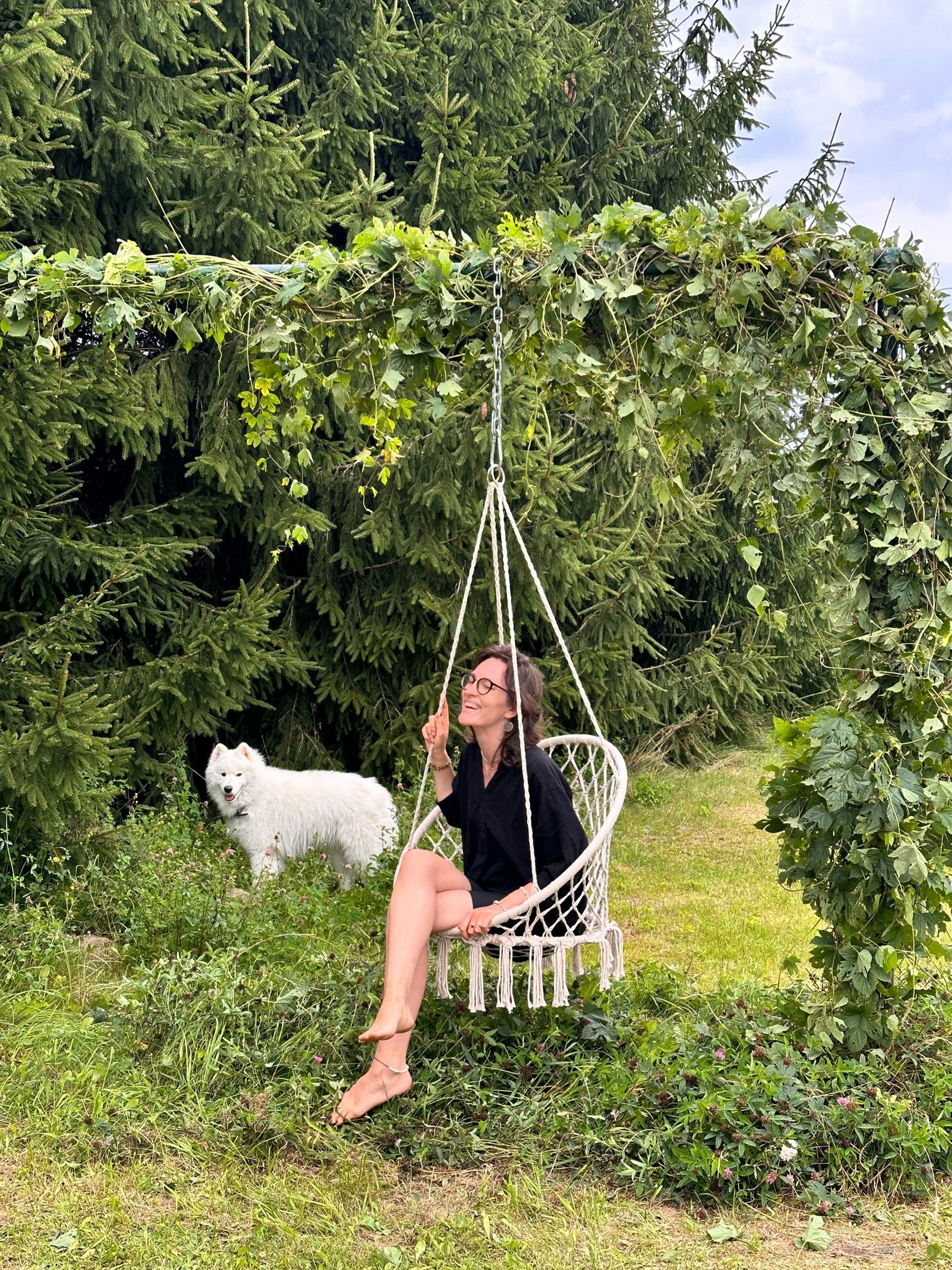 woman wearing yellow long-sleeved dress under white clouds and blue sky during daytime