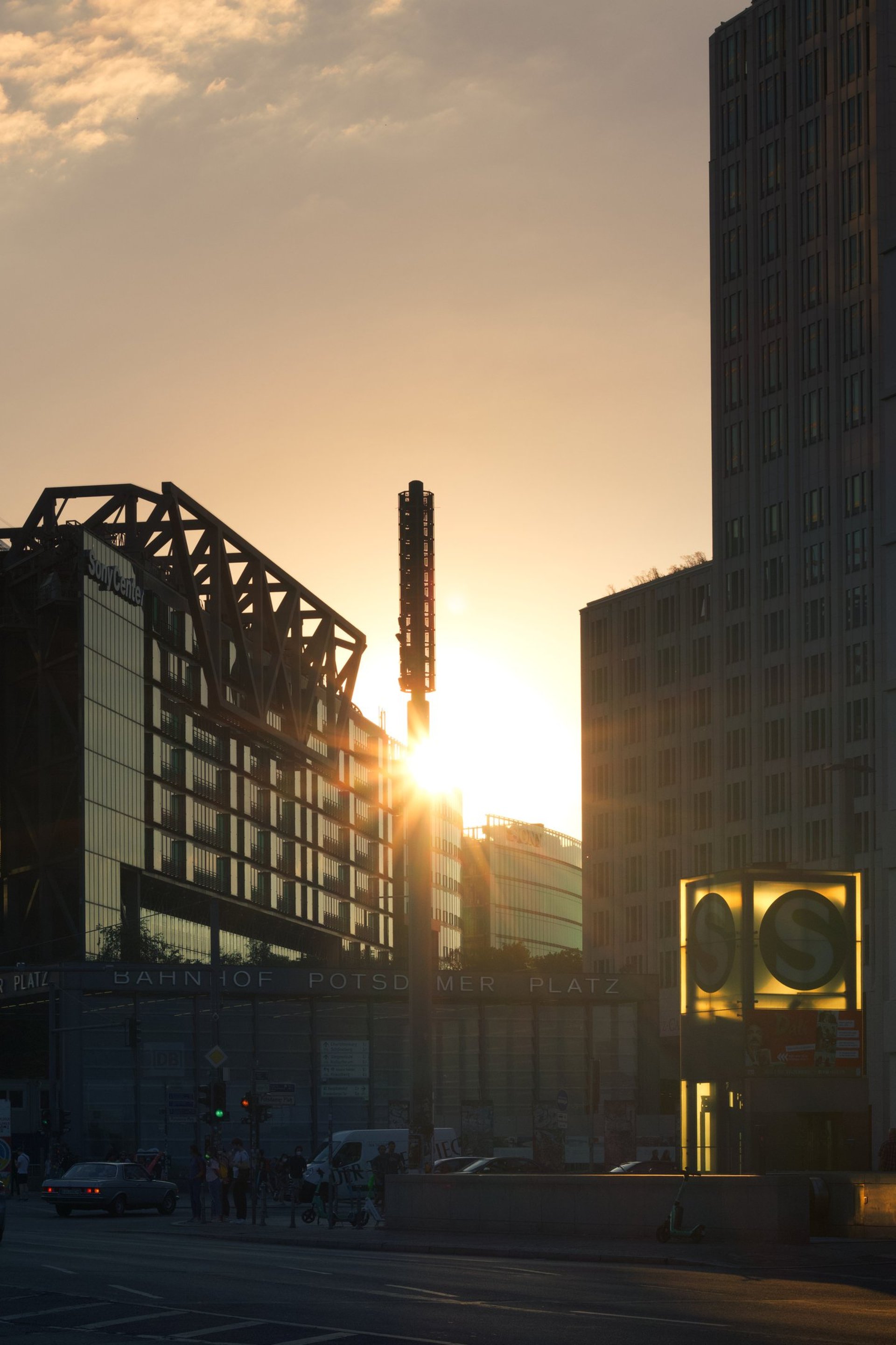 an abstract photo of a curved building with a blue sky in the background