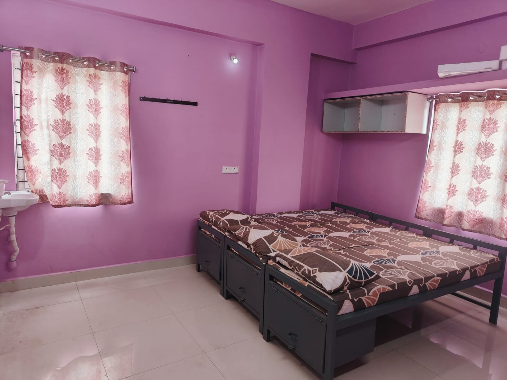 black and brown leather padded tub sofa