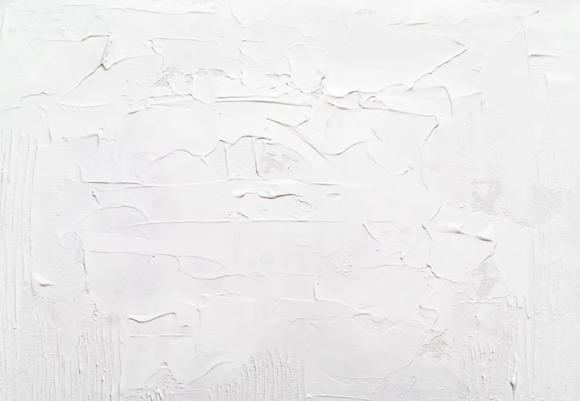 a white wall with some white paint on it