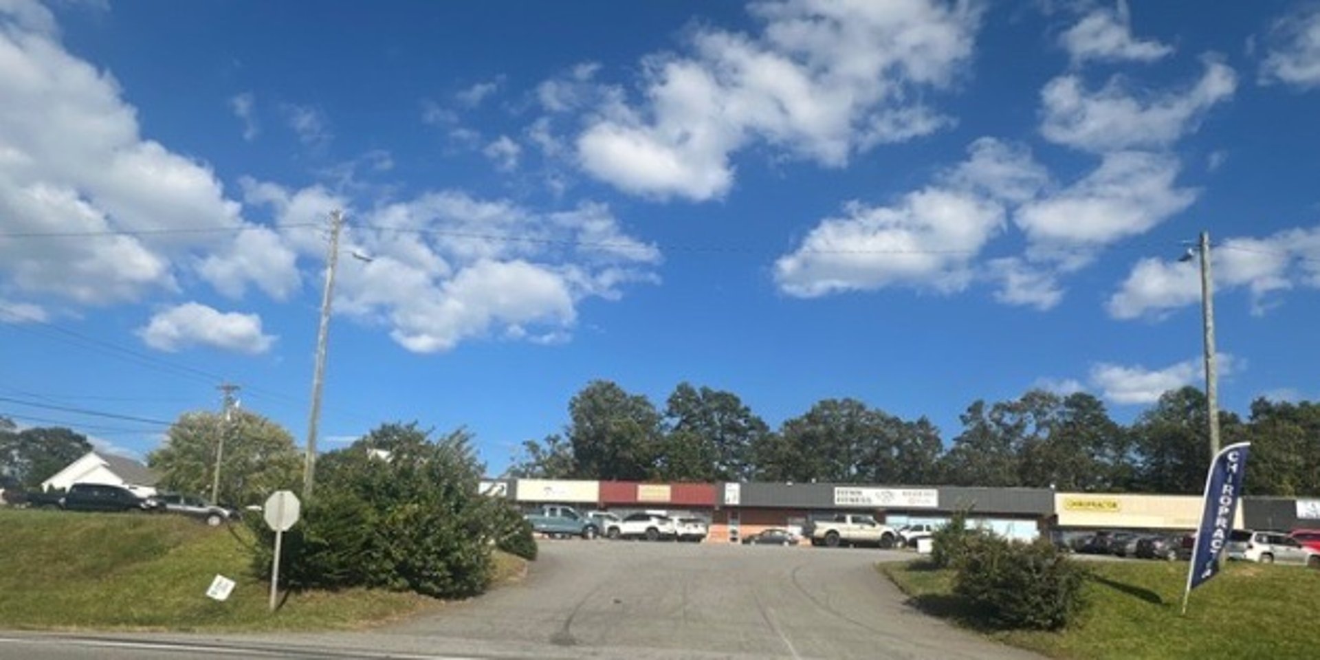 Weaverville Plaza with Flynn's Gym, Octopus Garden representing locksmith service 