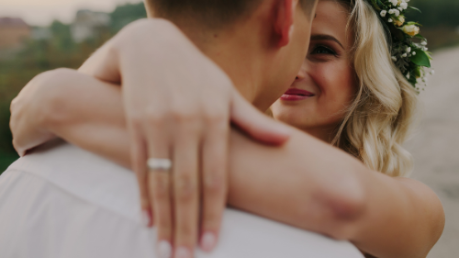 couple wearing silver-colored rings