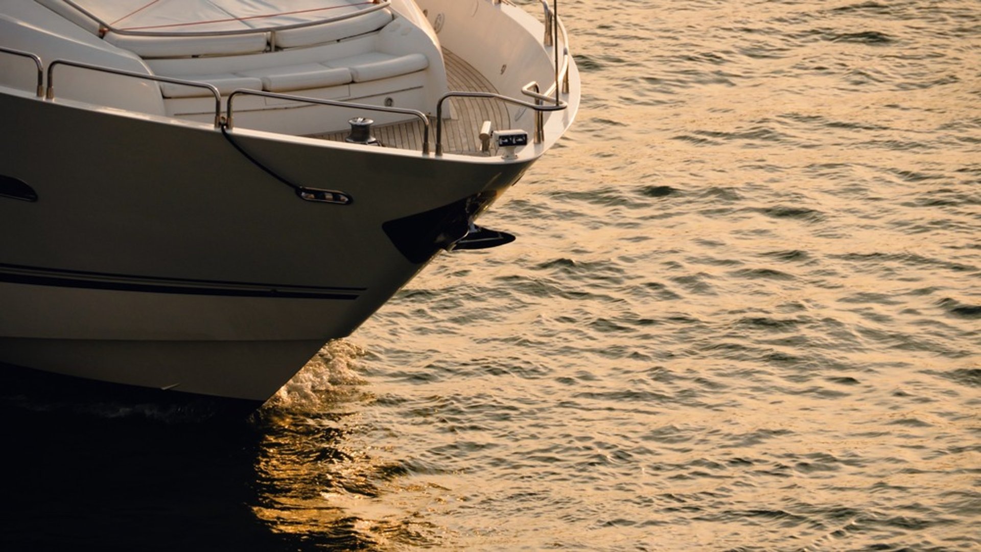an abstract photo of a curved building with a blue sky in the background