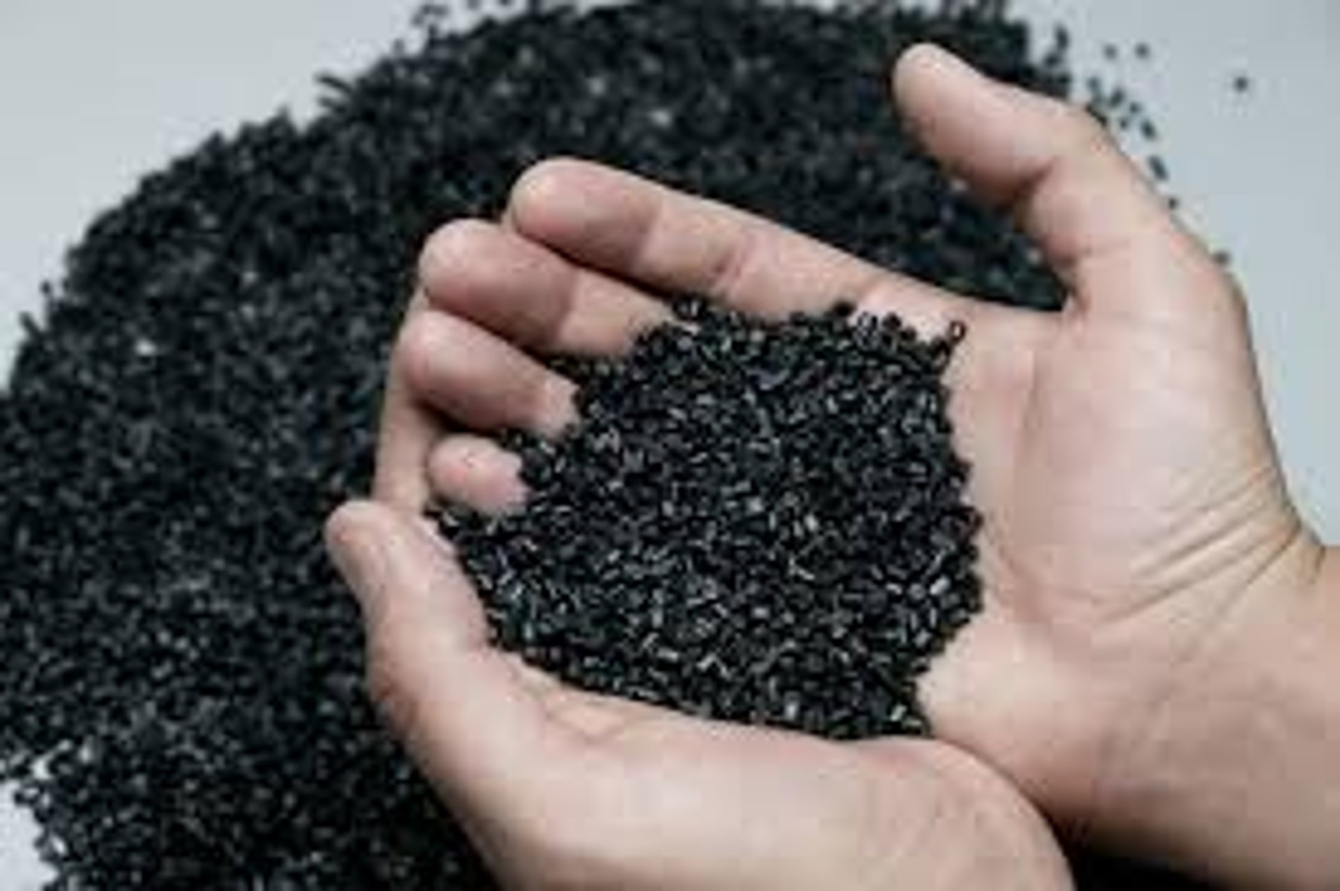 an abstract photo of a curved building with a blue sky in the background